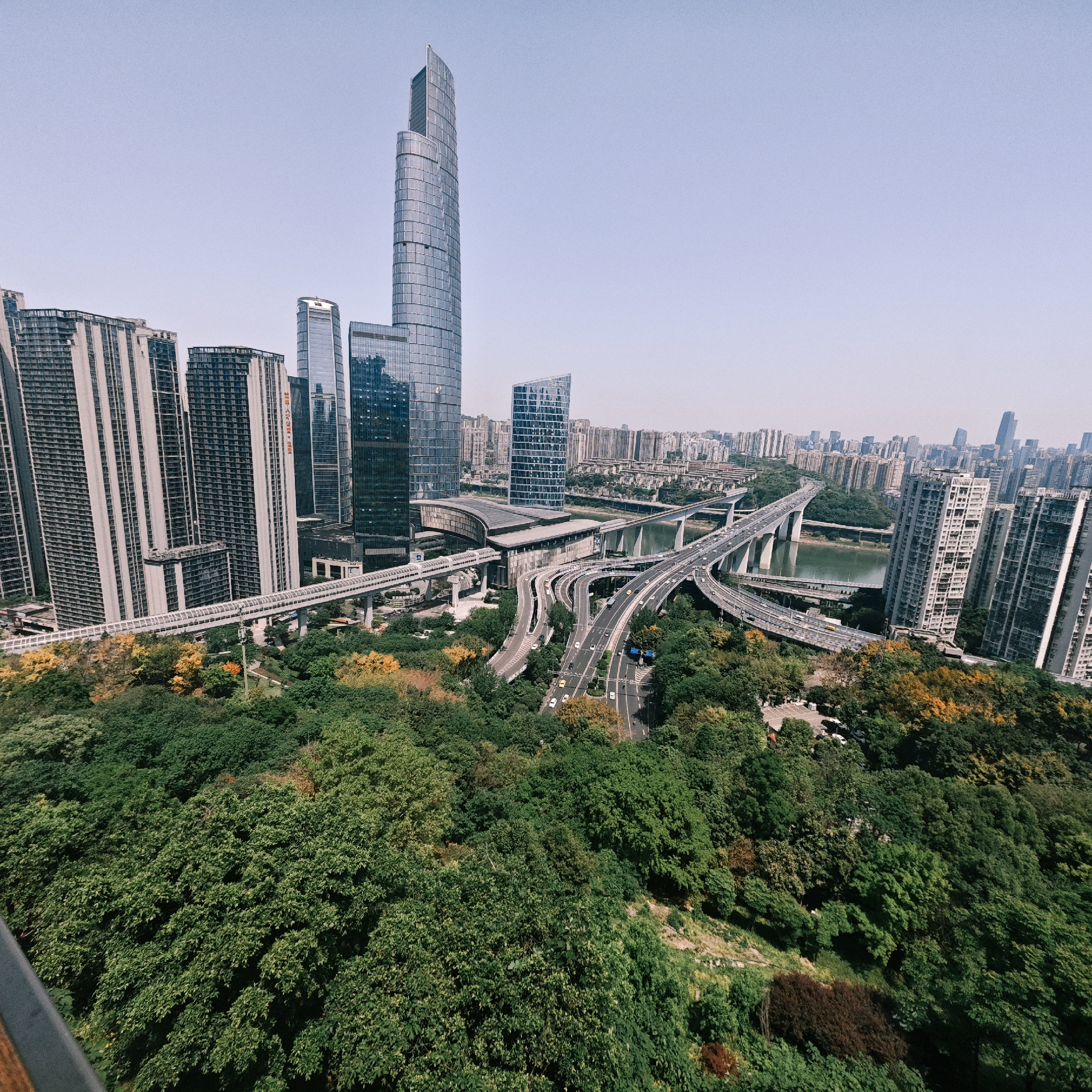 Daytime aerial views document Yuzhong District's urban landscape