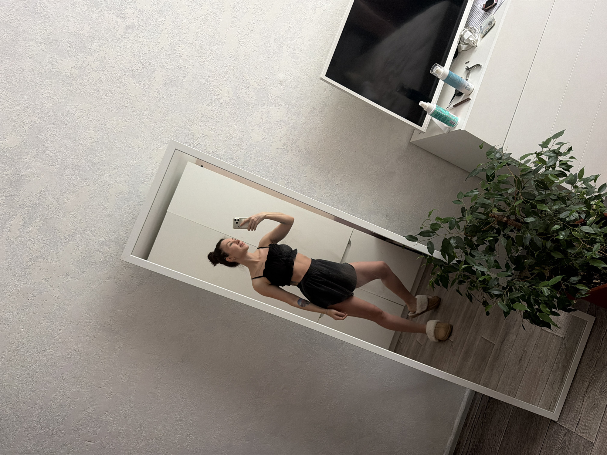 Woman takes morning mirror selfies in Perm, Russia