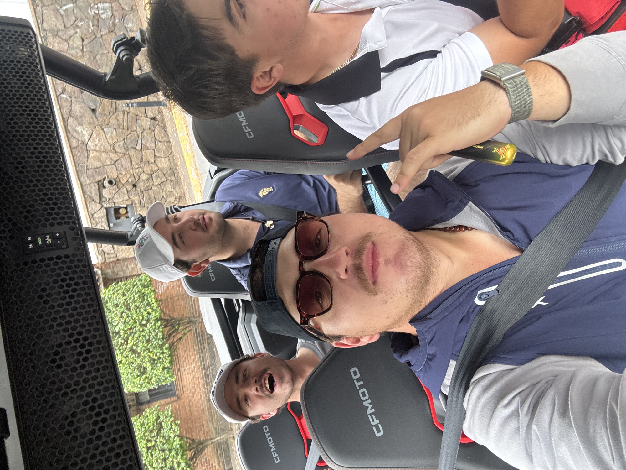 Three men travel by vehicle in Avandaro, Mexico