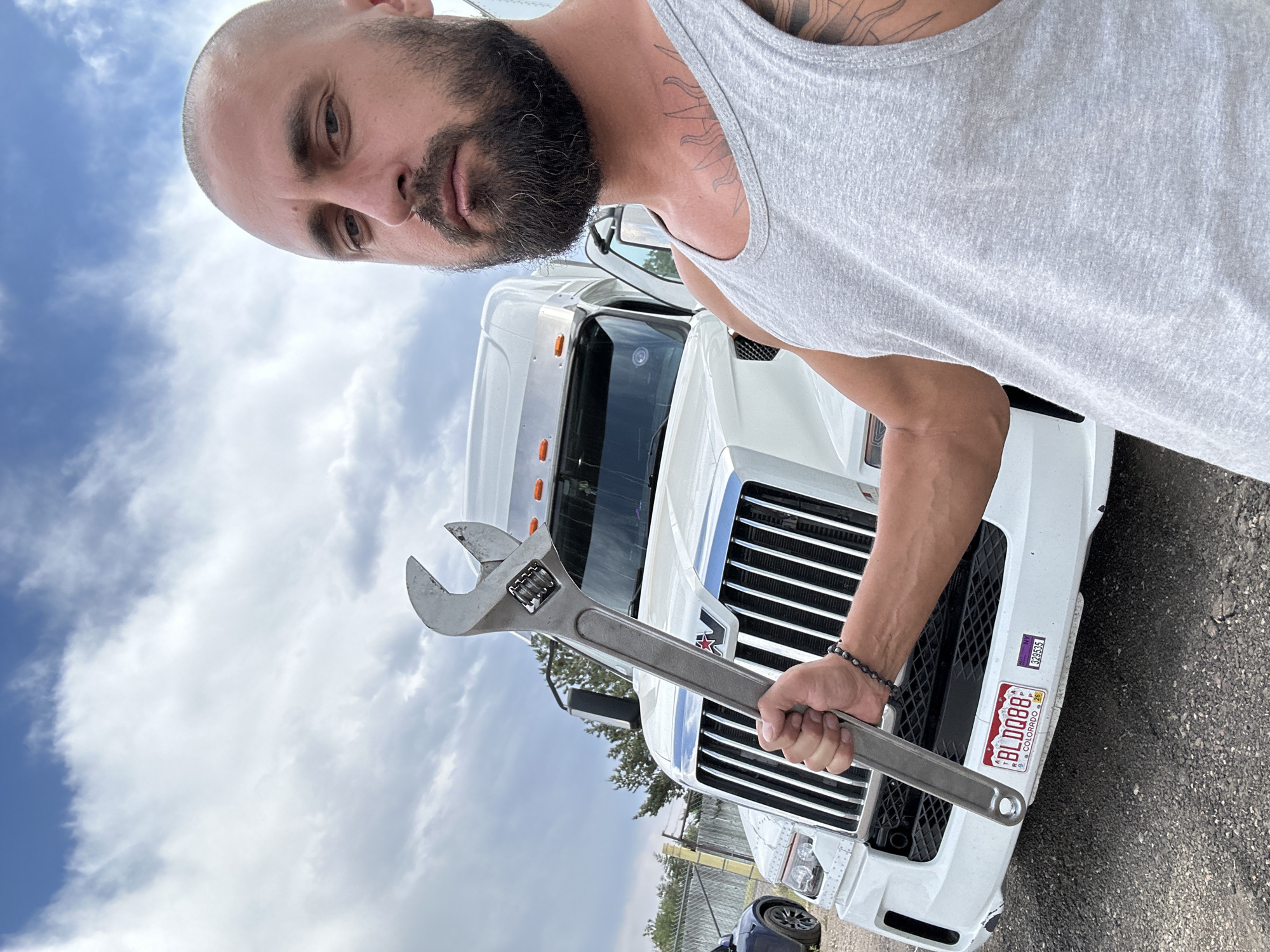 Semi-truck inspection and walkthrough at Aurora dealership lot
