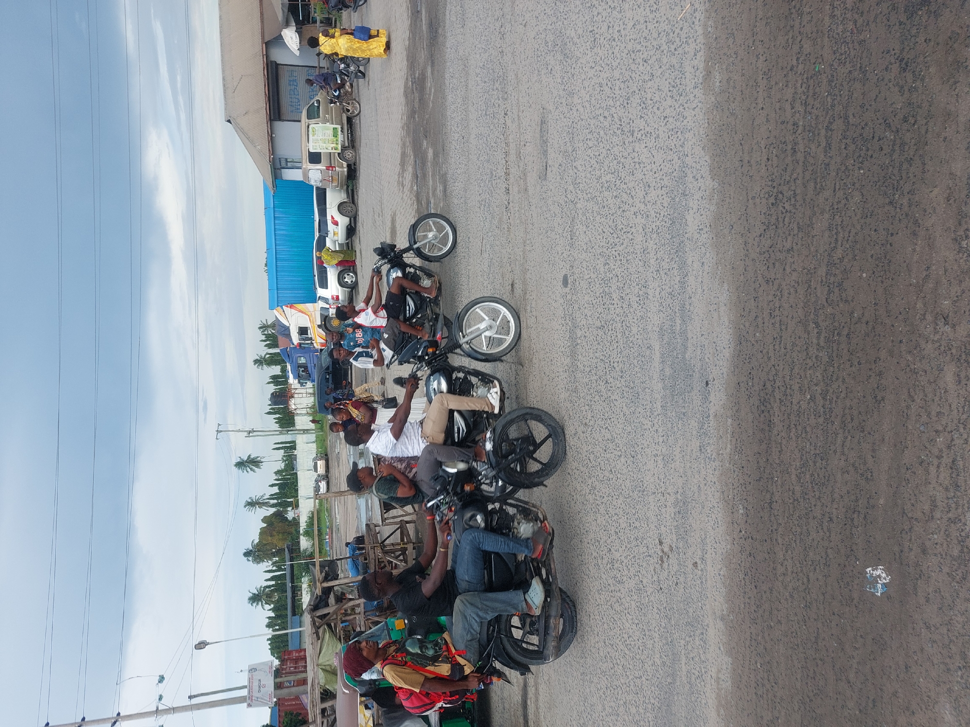 Street scenes with motorcycles and public transport in Dar es Salaam