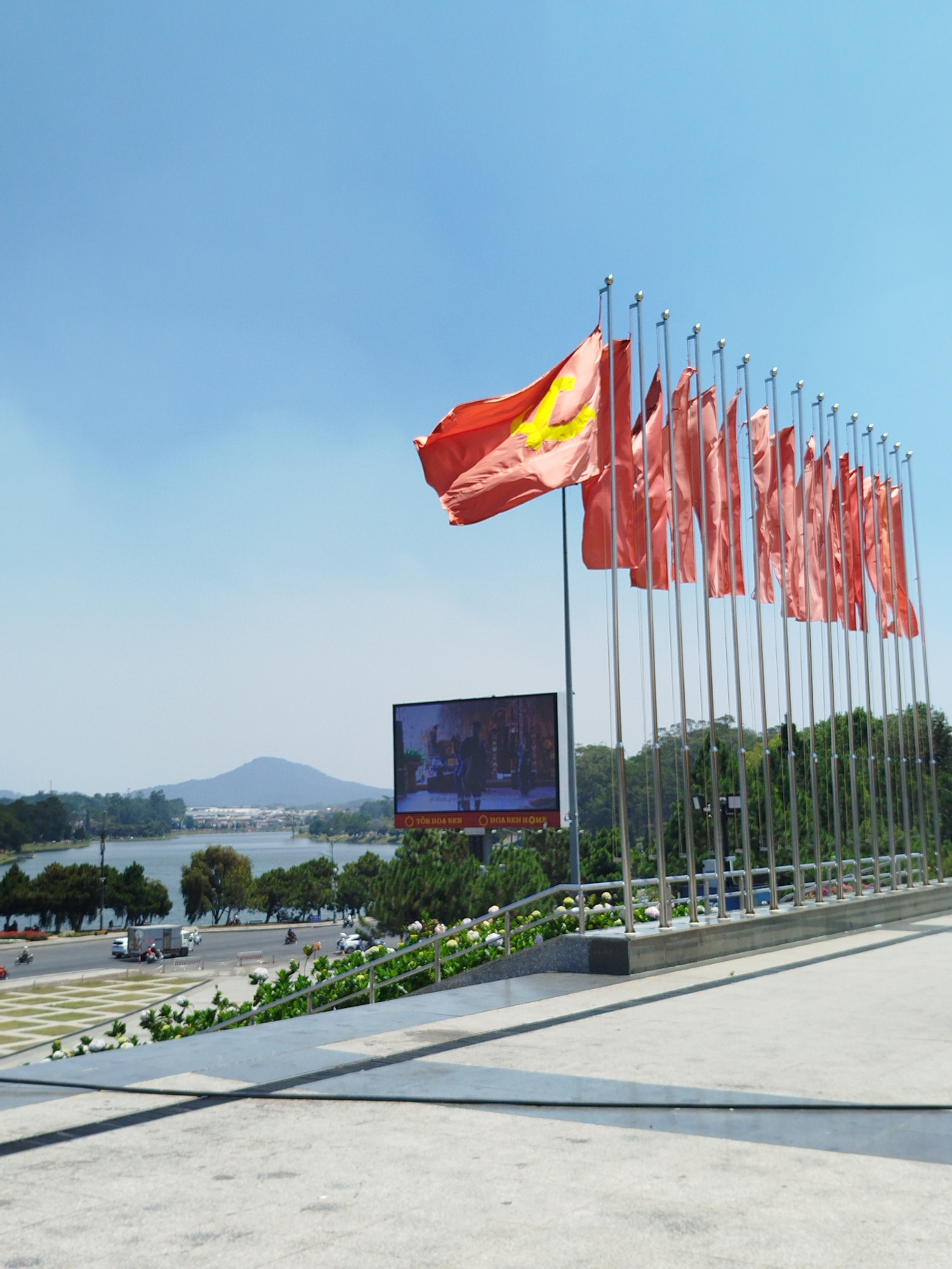 Vietnamese flags displayed along Xuan Huong Lake in Da Lat