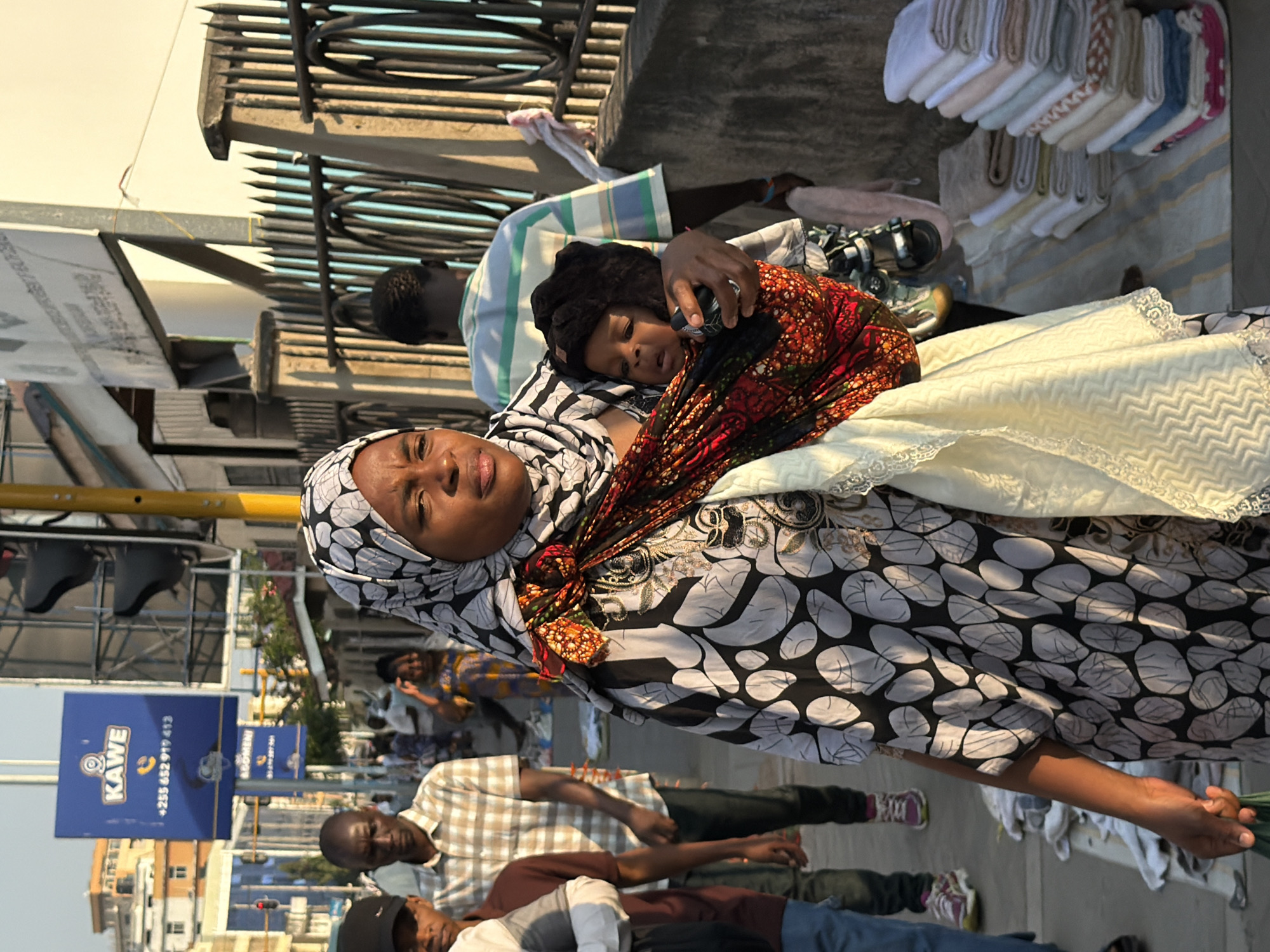 Midday street traffic flows through urban Dar es Salaam