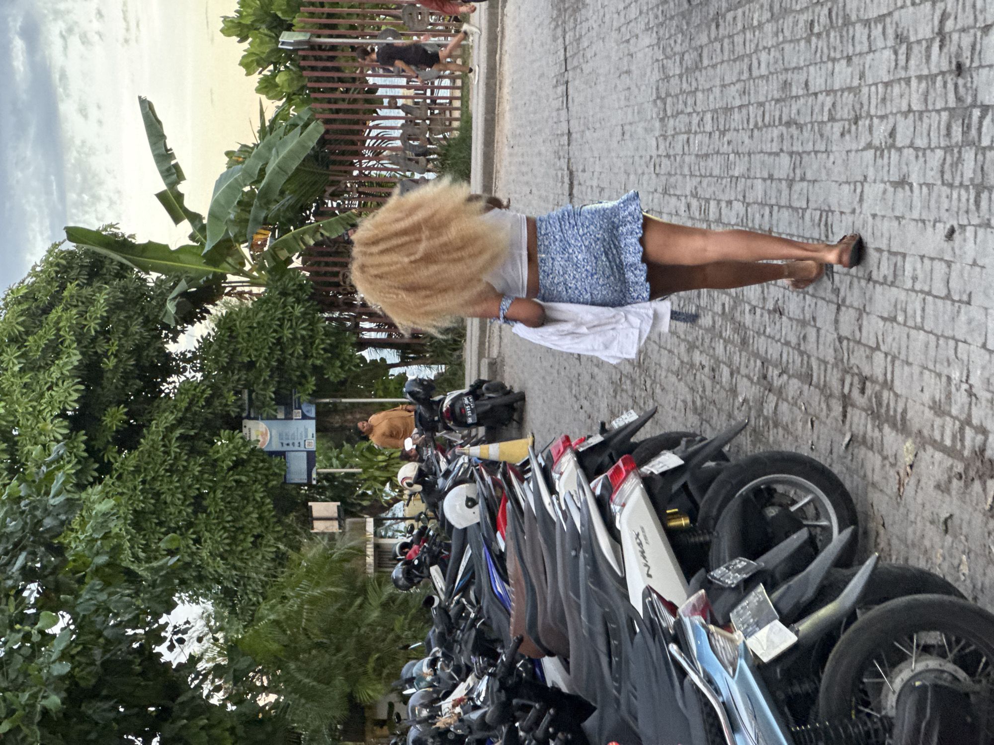 Tourist and local scenes captured across Denpasar during morning hours