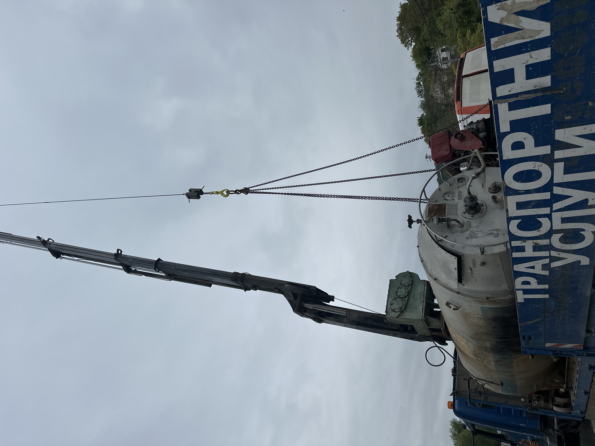 Industrial container loaded onto transport truck in Varna