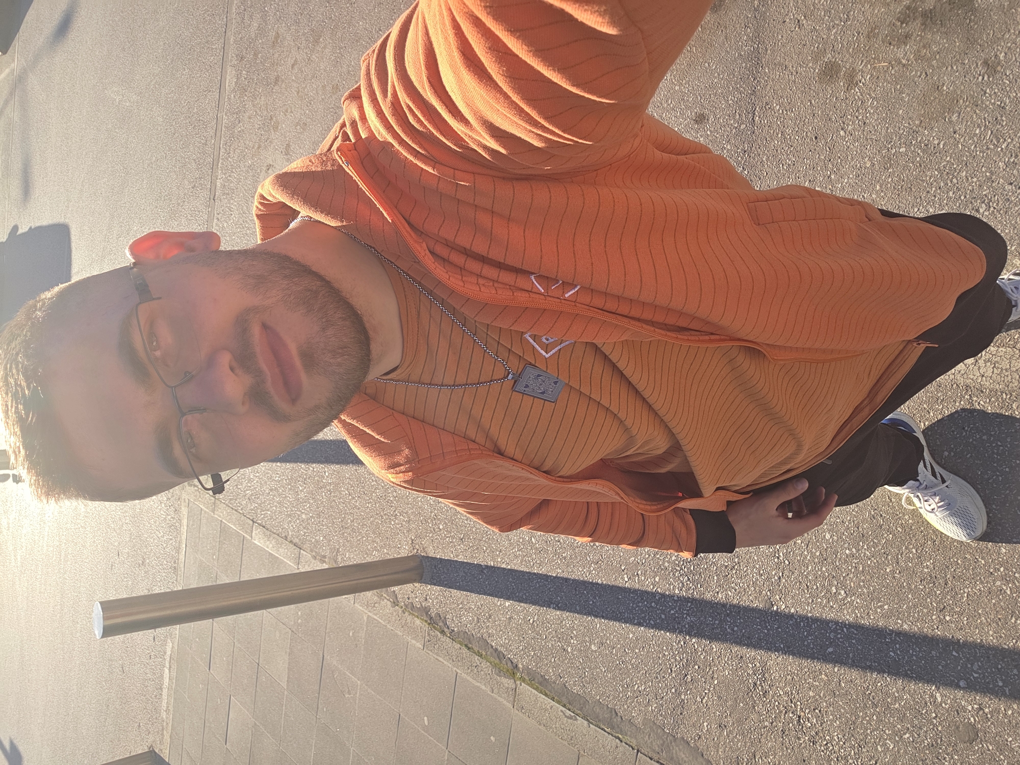 Man in orange outfit observed near railing in Plovdiv