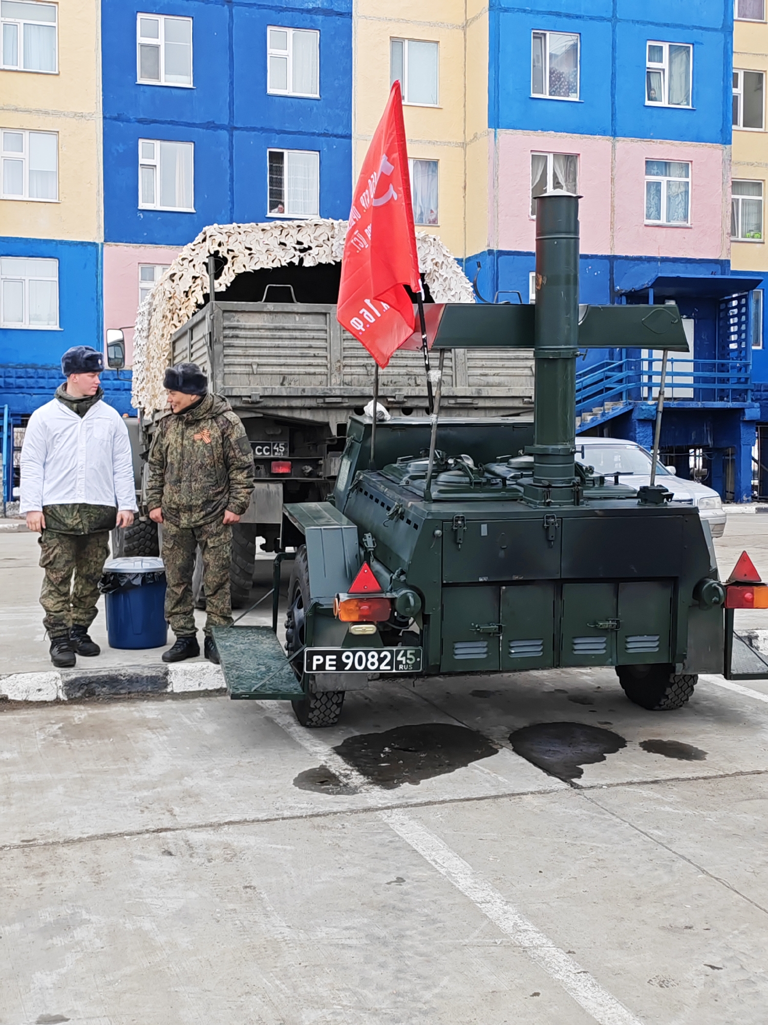 Military personnel conduct outdoor cooking operations in Ugolnye Kopi