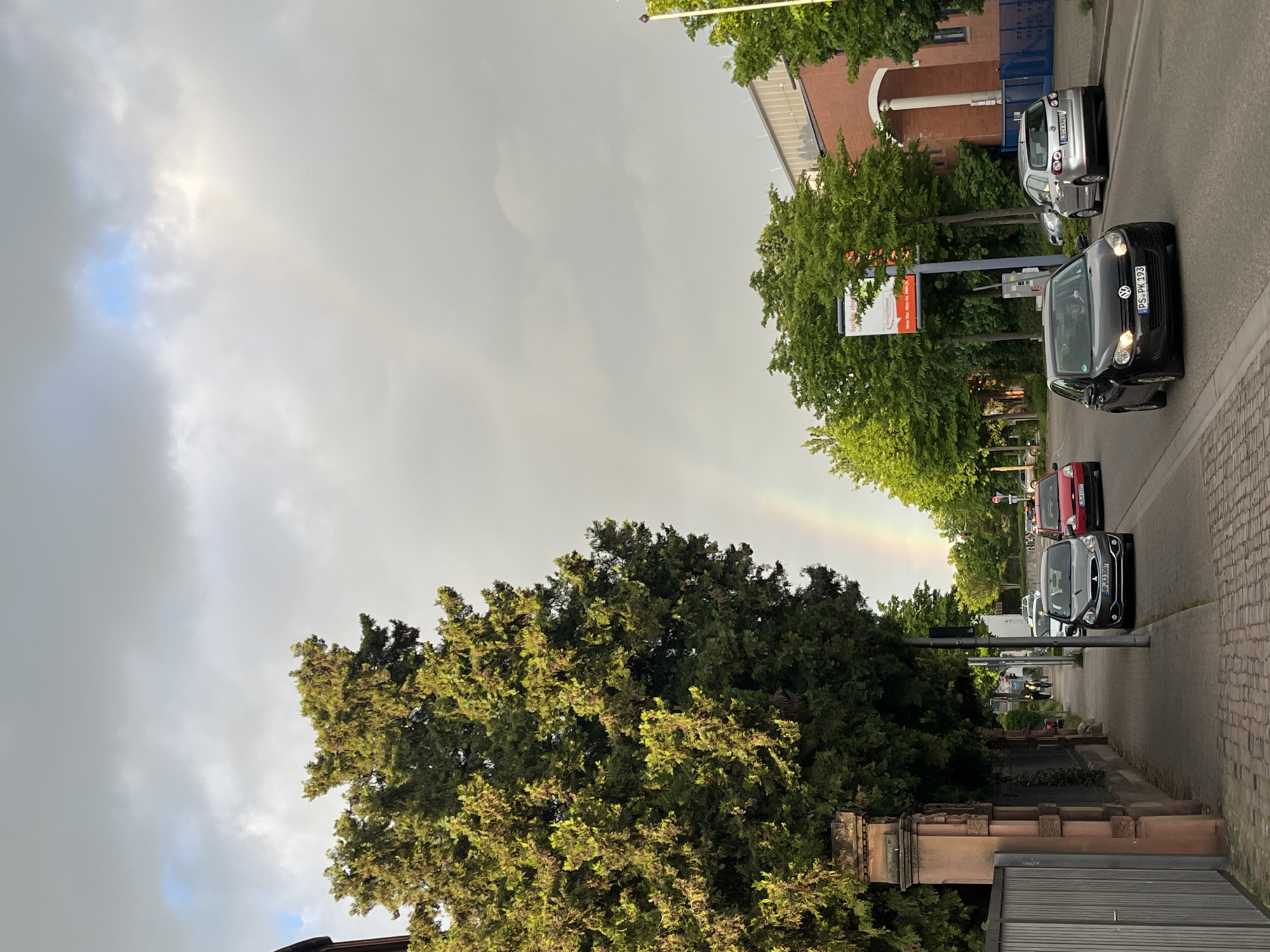 Rainbow appears over Landau in der Pfalz during evening