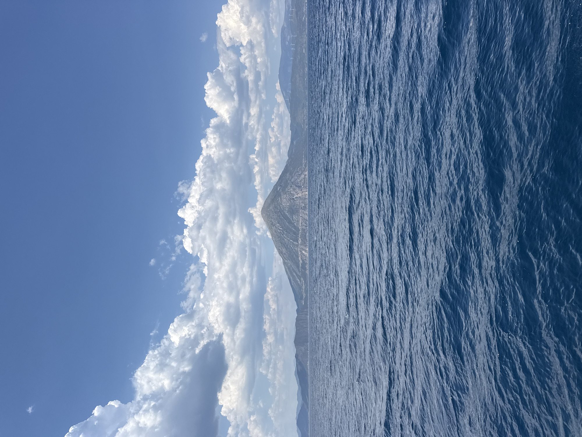 Out on the water off Patras, mountains on the horizon