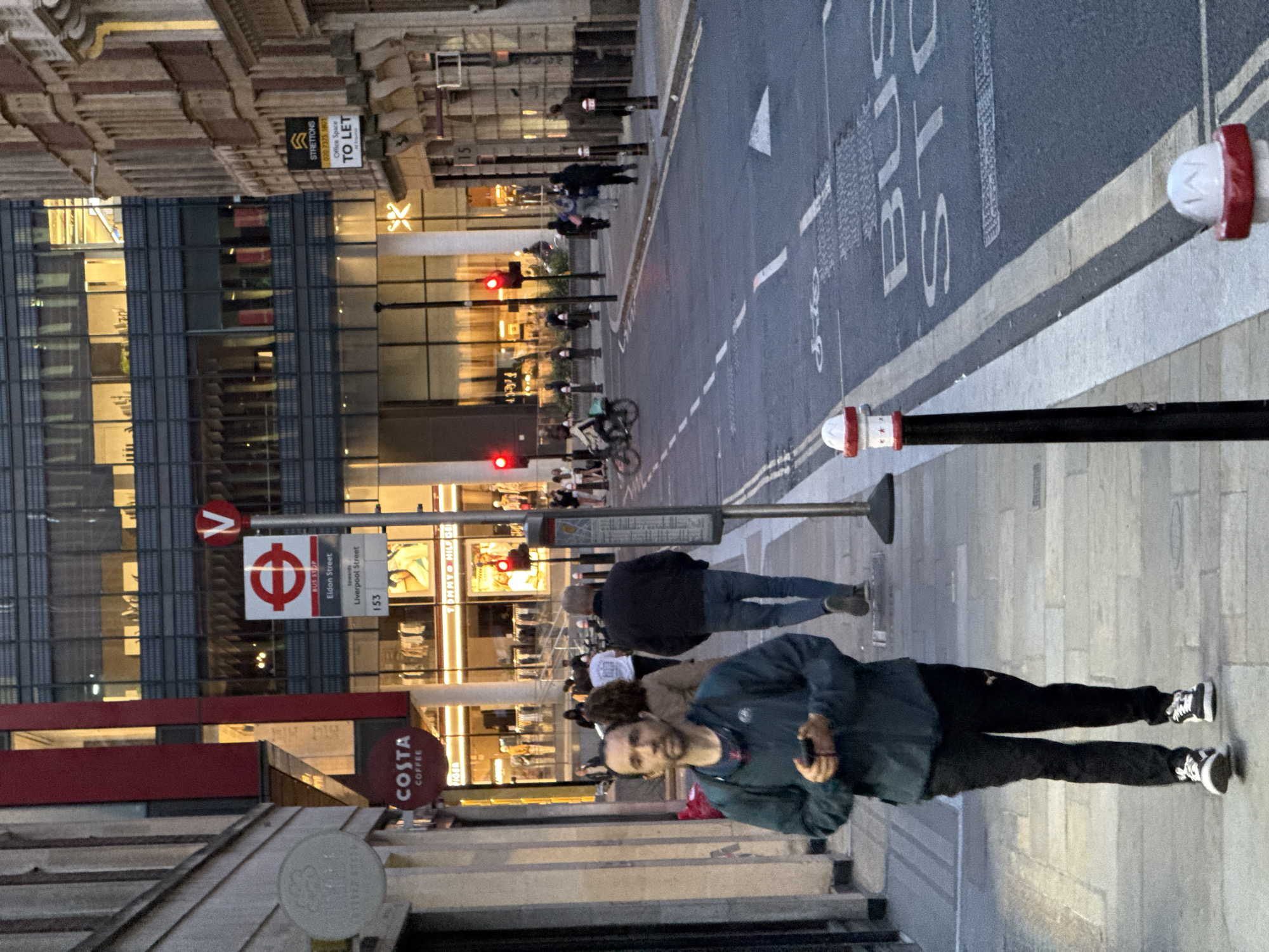 London street scenes captured near Costa Coffee and colorful buildings