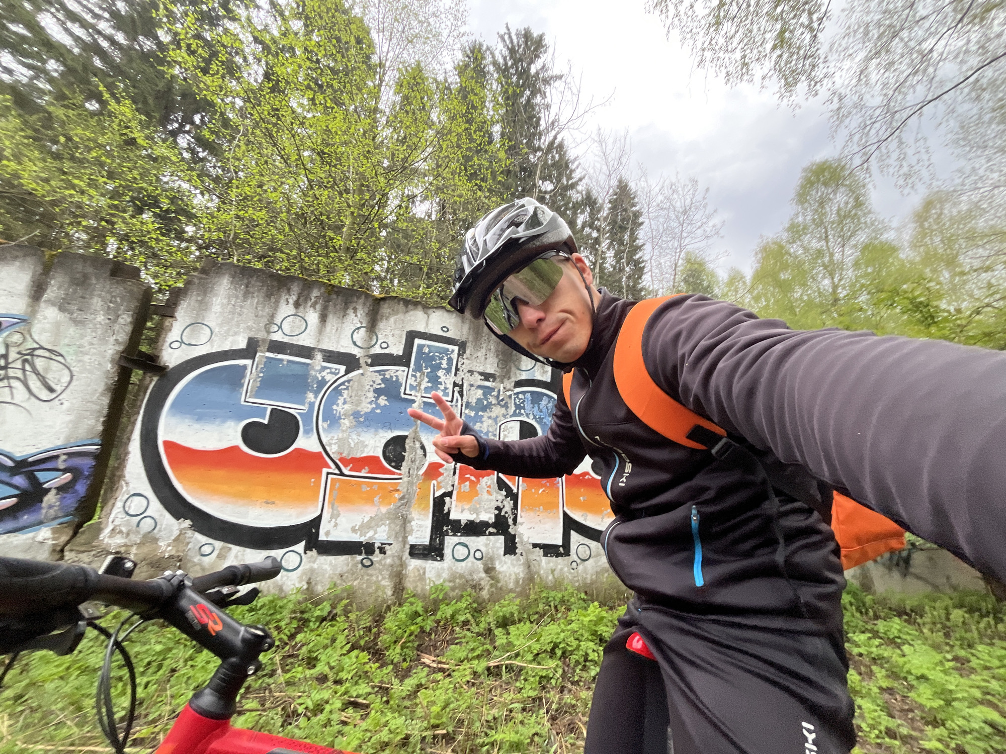 Cyclist takes selfies during early morning mountain bike ride