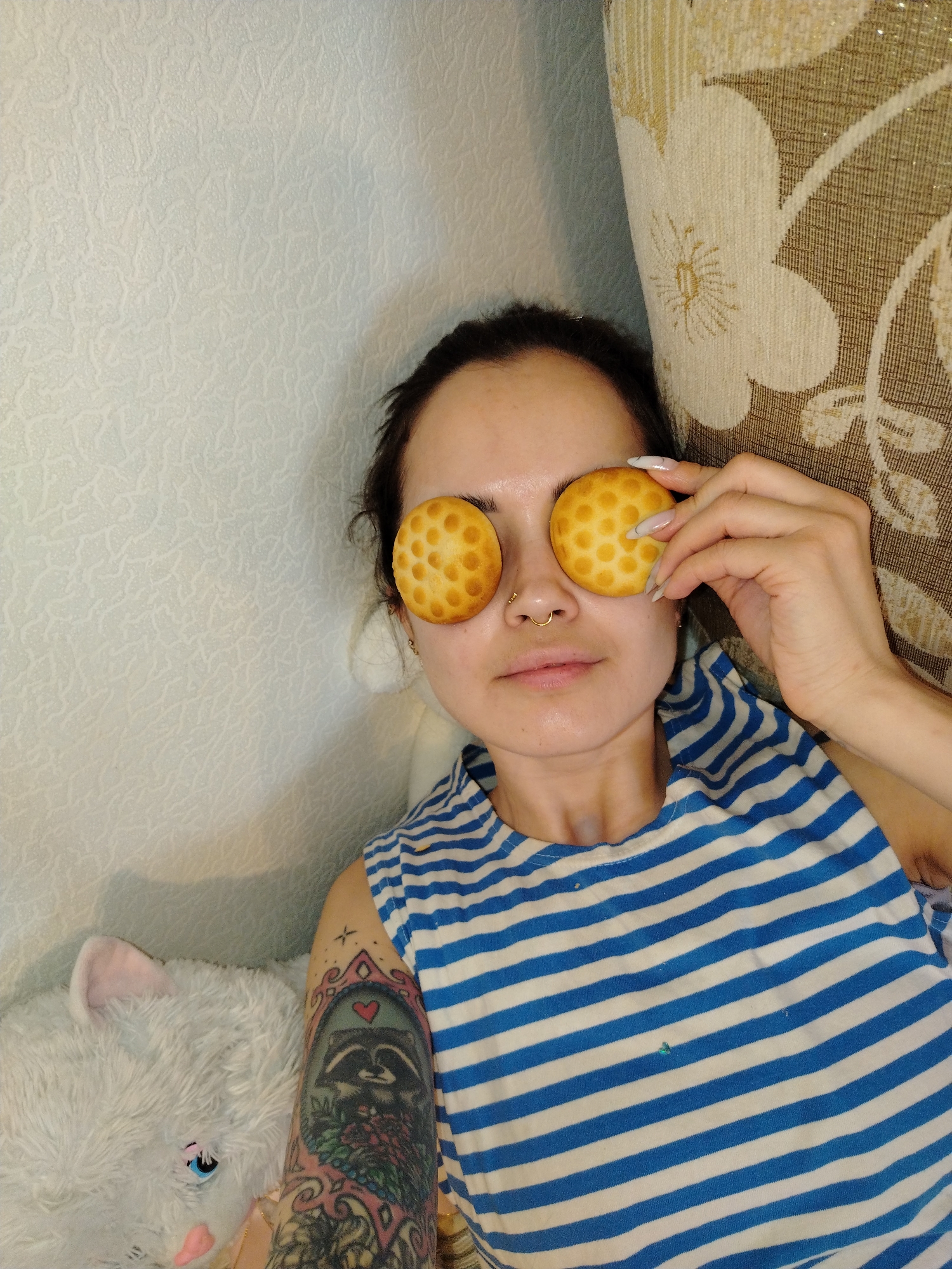 Woman photographed in playful cookie moment, separate green shirt portrait