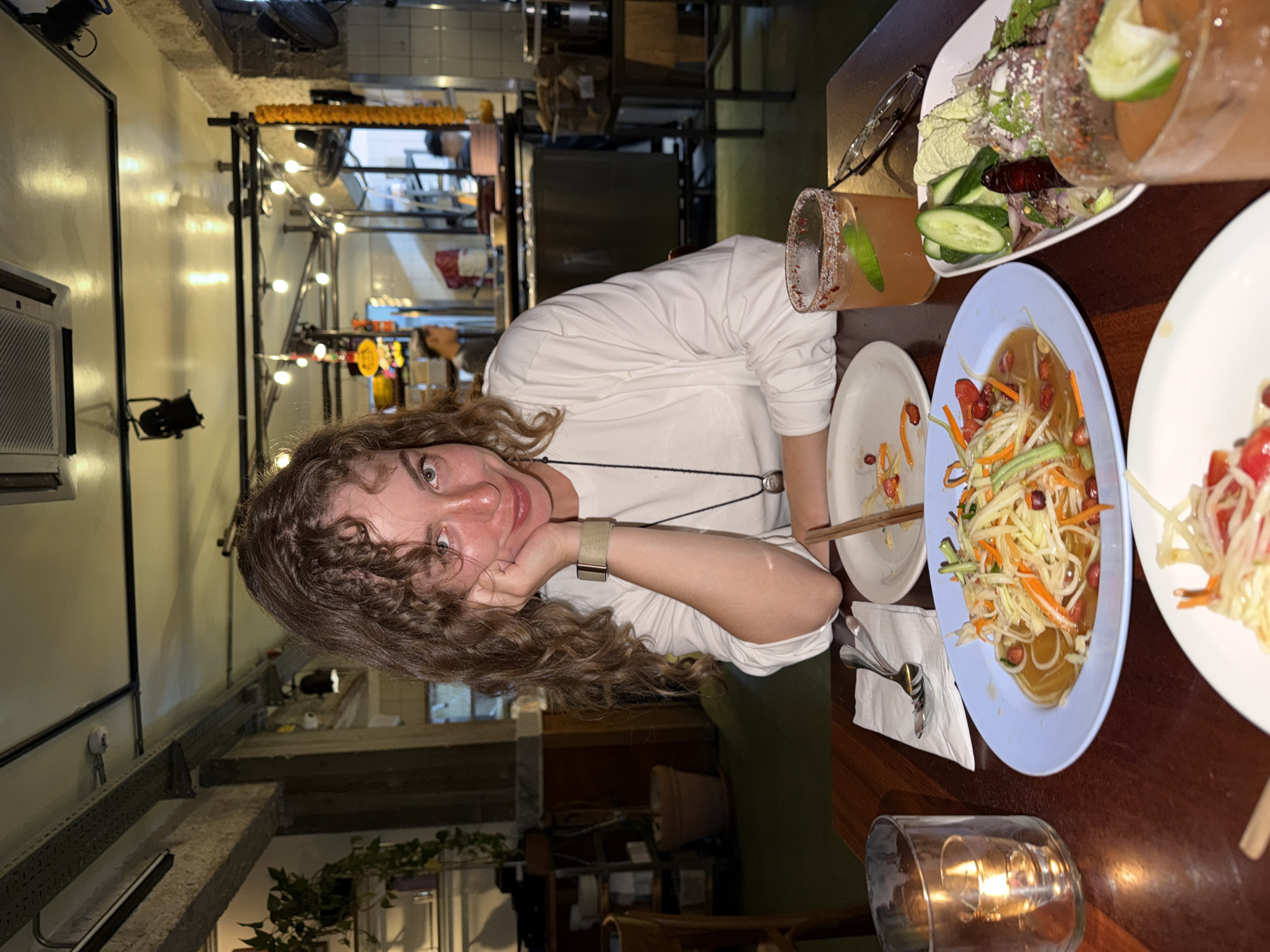 Dinner at a Tel Aviv restaurant, plates mid-meal