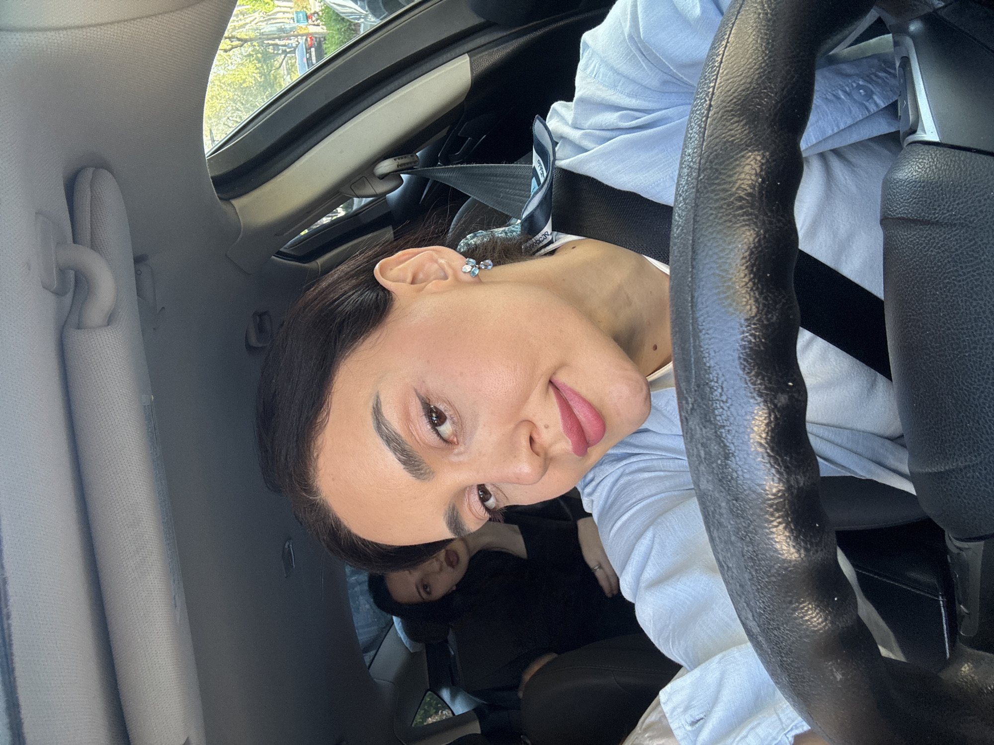 Woman takes playful car selfies in Tbilisi