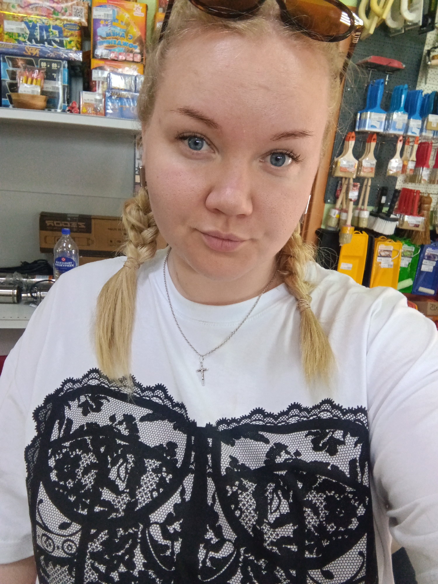 Woman takes selfies at hardware store in Фоки, Russia