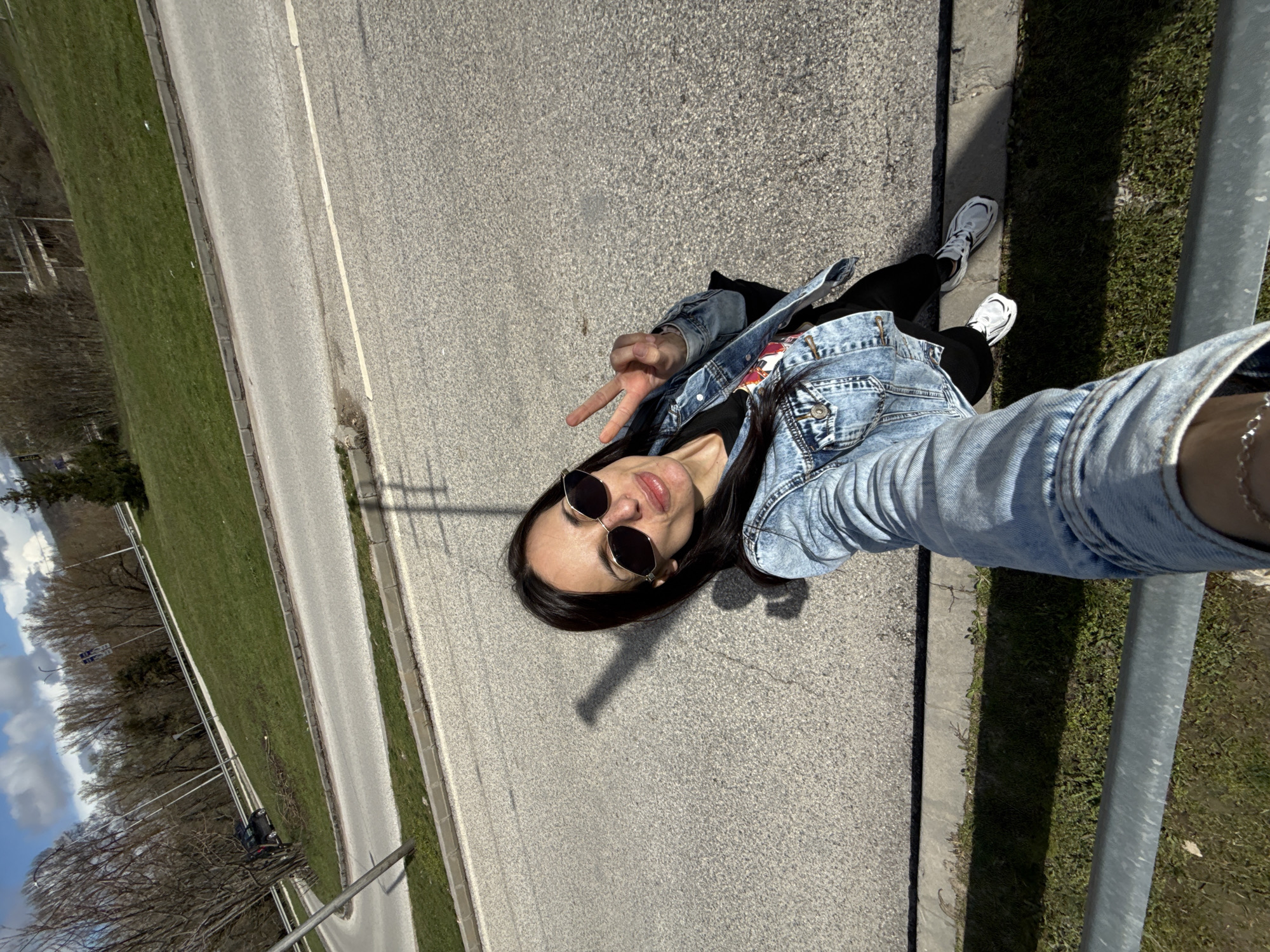 Woman takes selfie on sunny day in Pleven, Bulgaria