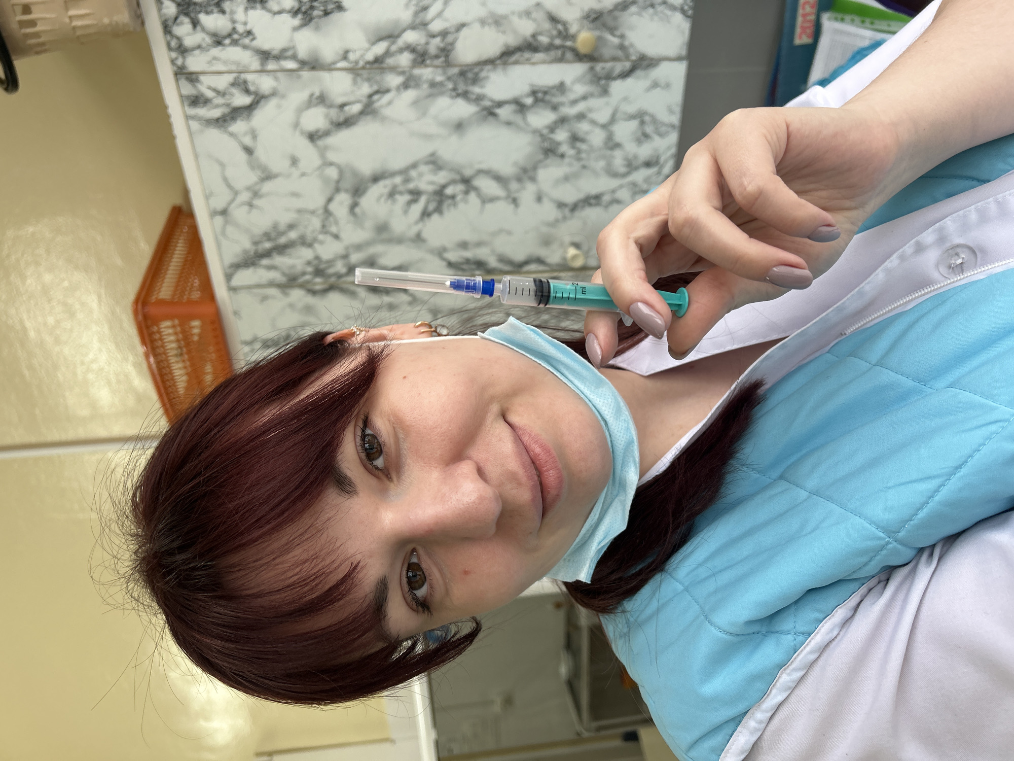 Medical worker takes selfie with syringe in Russia