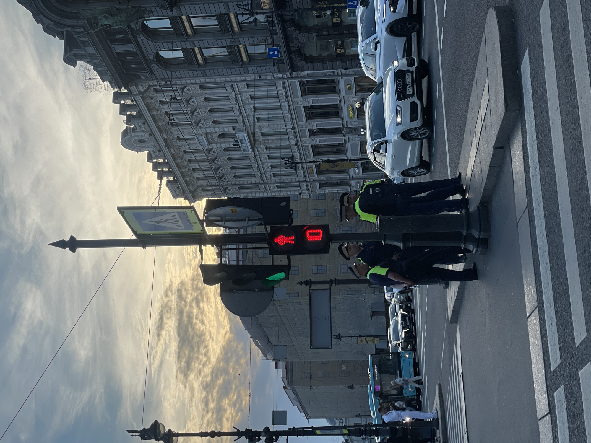 Evening street life documented across central Saint Petersburg landmarks