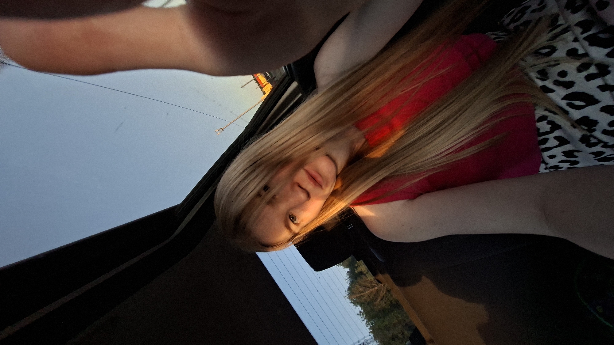 Woman documents car journey with selfie near Chaikovsky, Russia