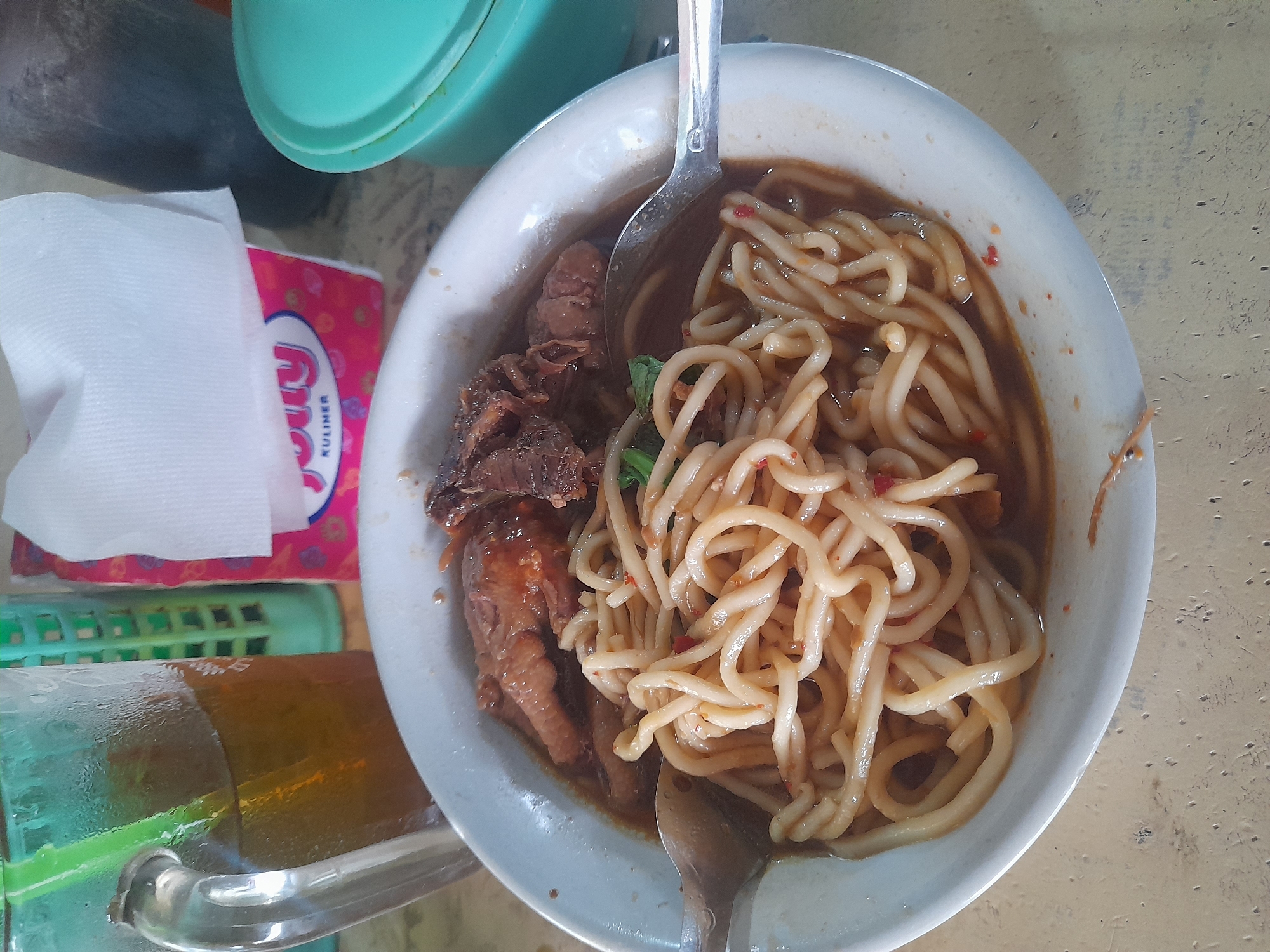 Family meal at Indonesian noodle restaurant in Balonggabus
