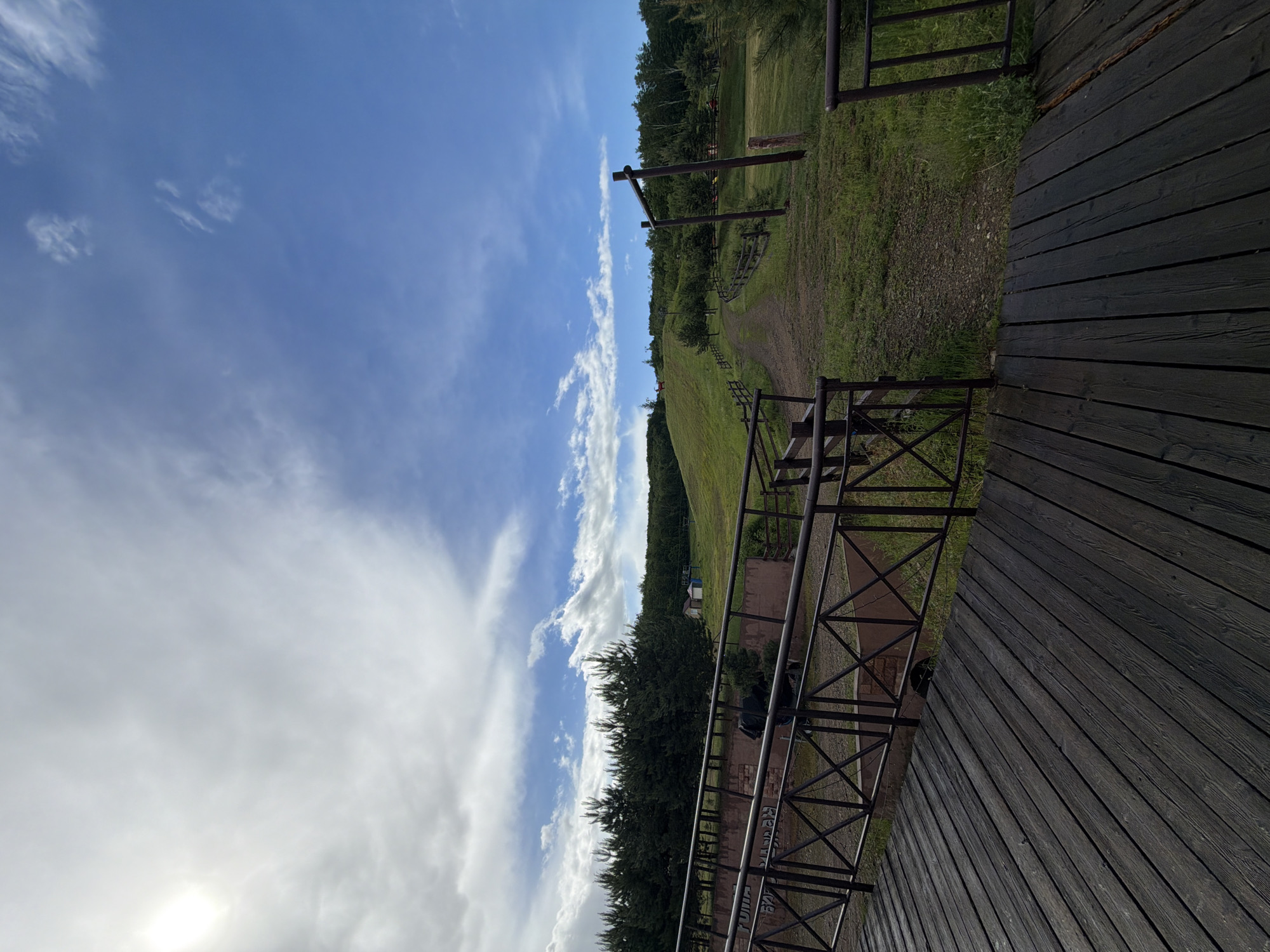 Selfies on wooden platform overlooking Birobidzhan countryside