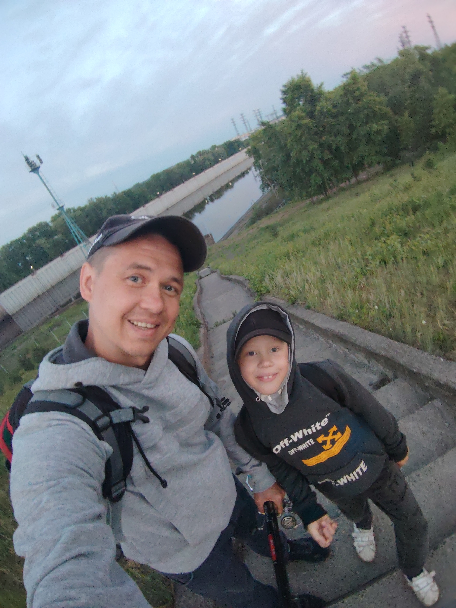 Father and son enjoy twilight fishing trip in Chaikovsky