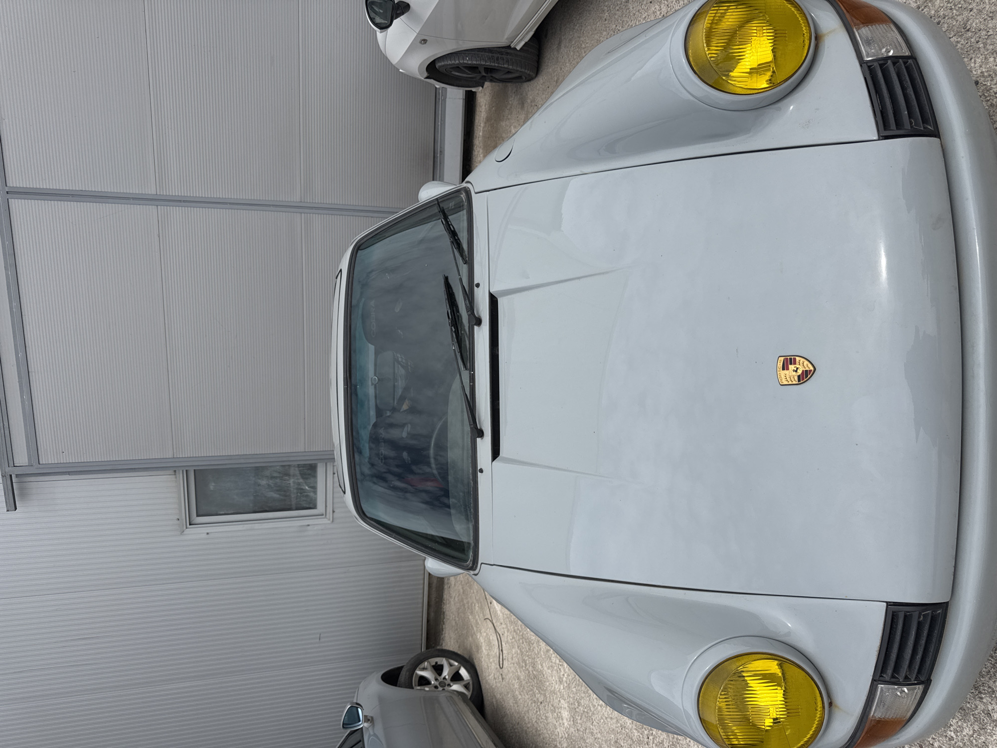 Porsche 911 restoration work documented in Montenegro village