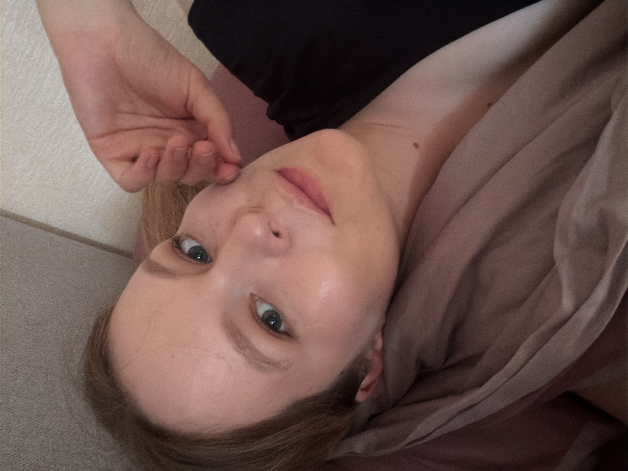 Casual close-up portrait, resting on a pillow