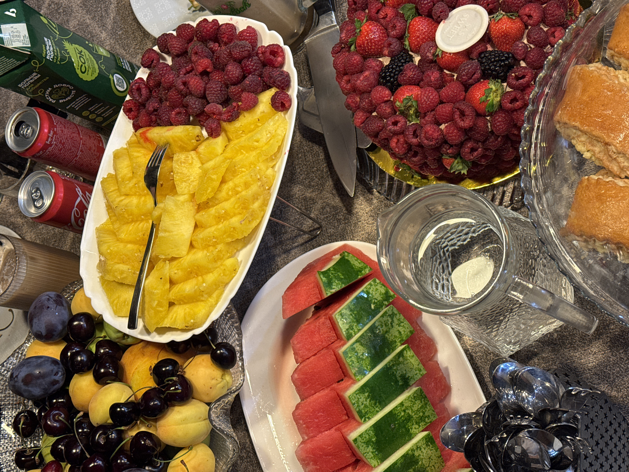 Festive fruit and dessert spread at a Yerevan gathering