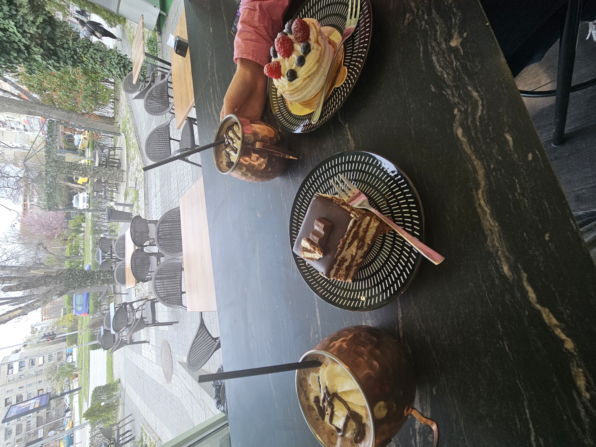 Afternoon moments in Plovdiv: desserts served, modern church photographed