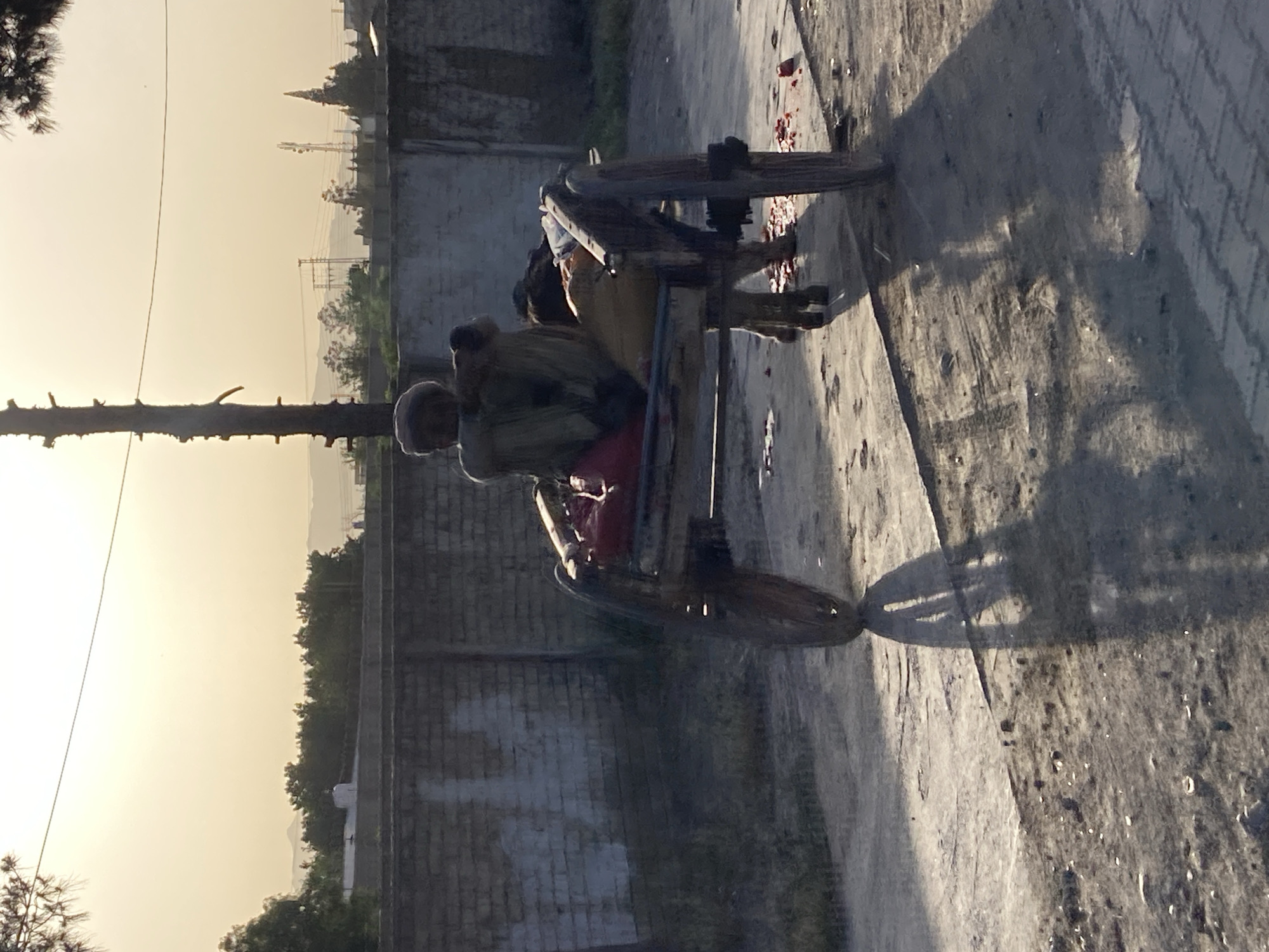 Street life captured in Quetta: cart rider, motorcycle duo