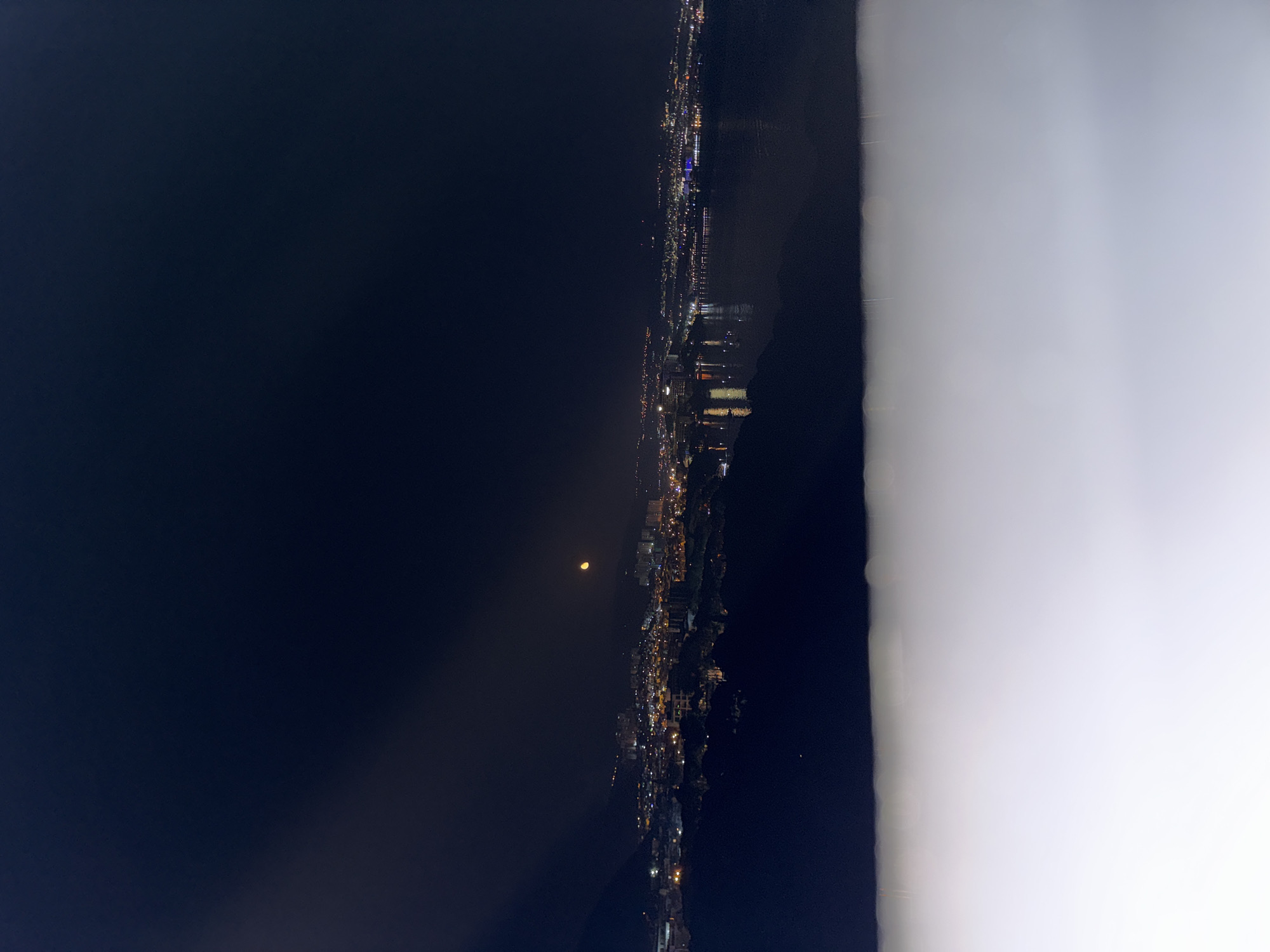 Nighttime panoramic views captured of Kuşadası, Turkey coastal cityscape