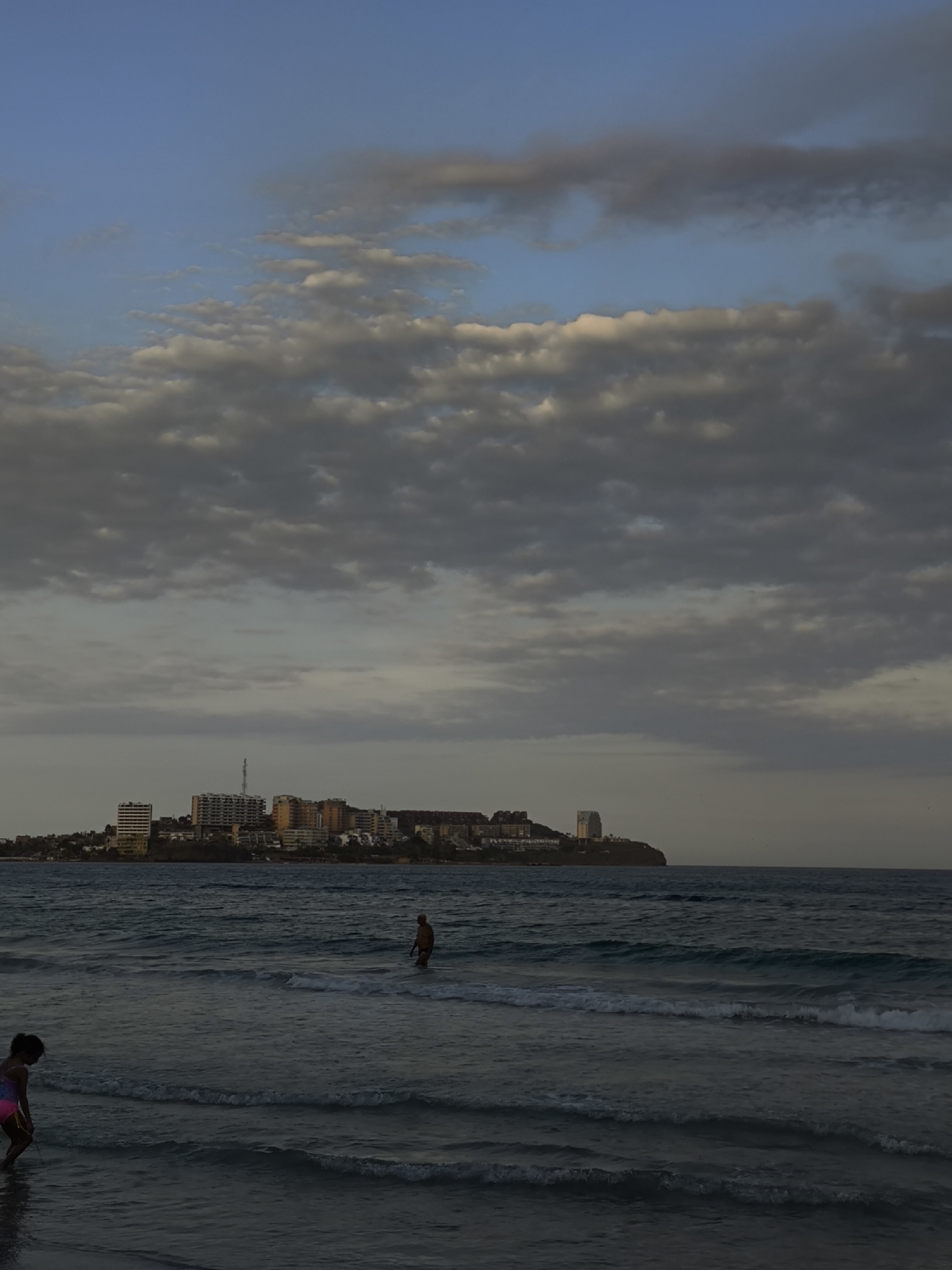Evening beach activities documented in Pampatar, Venezuela