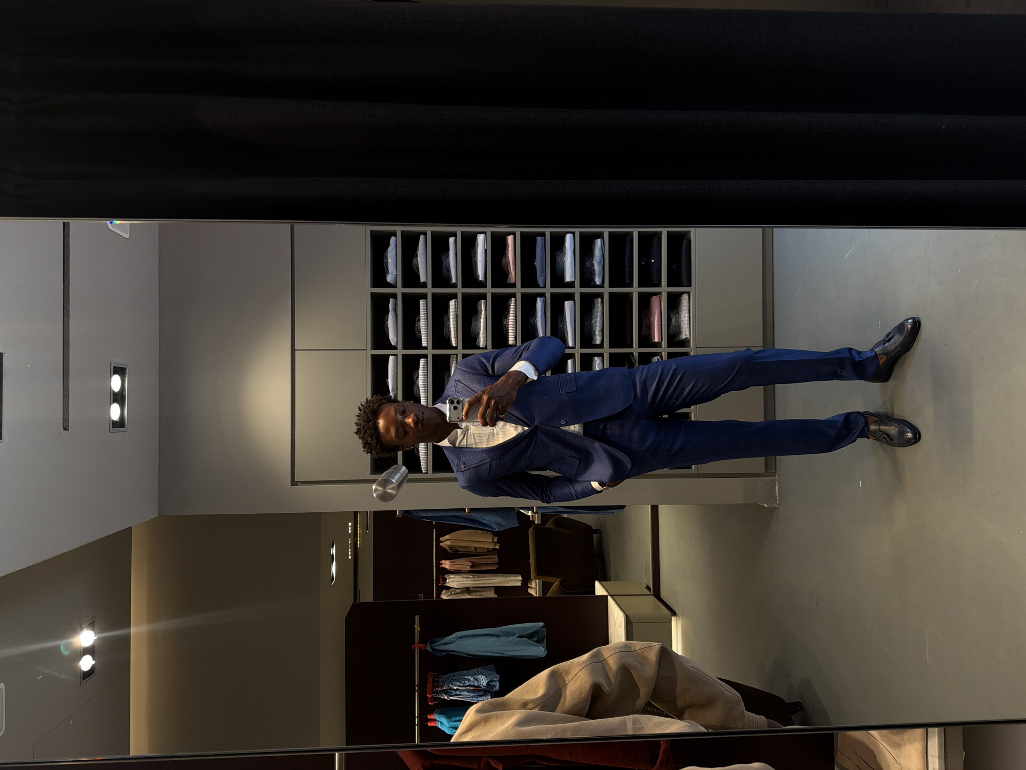 Trying on fits at a London retail store