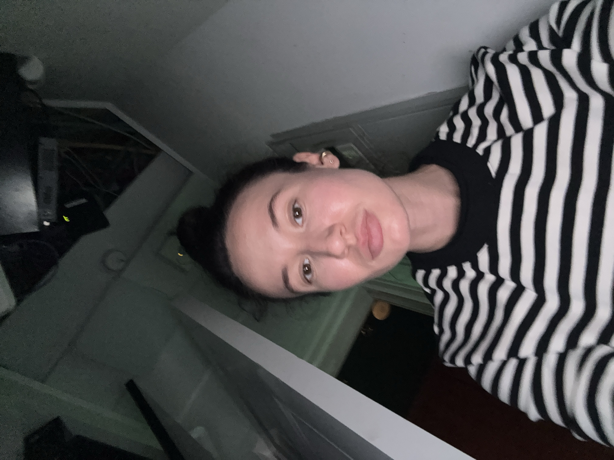 Nighttime selfie captured indoors in Tel Aviv