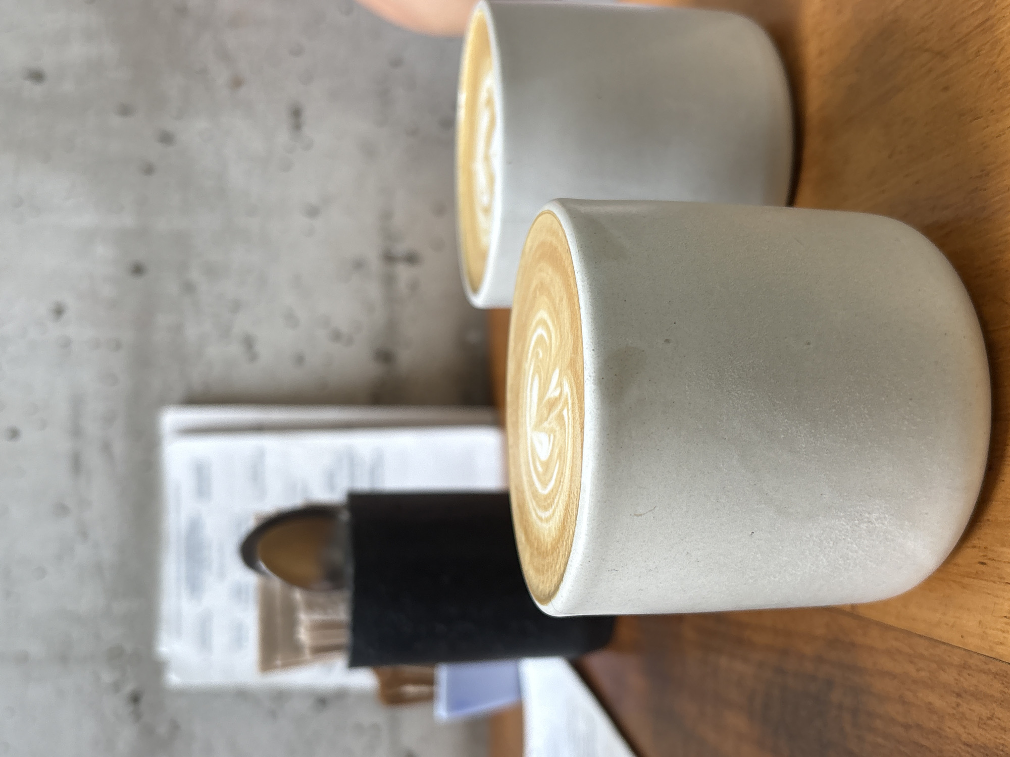 Cafe visit documented in Miraflores with coffee and plants