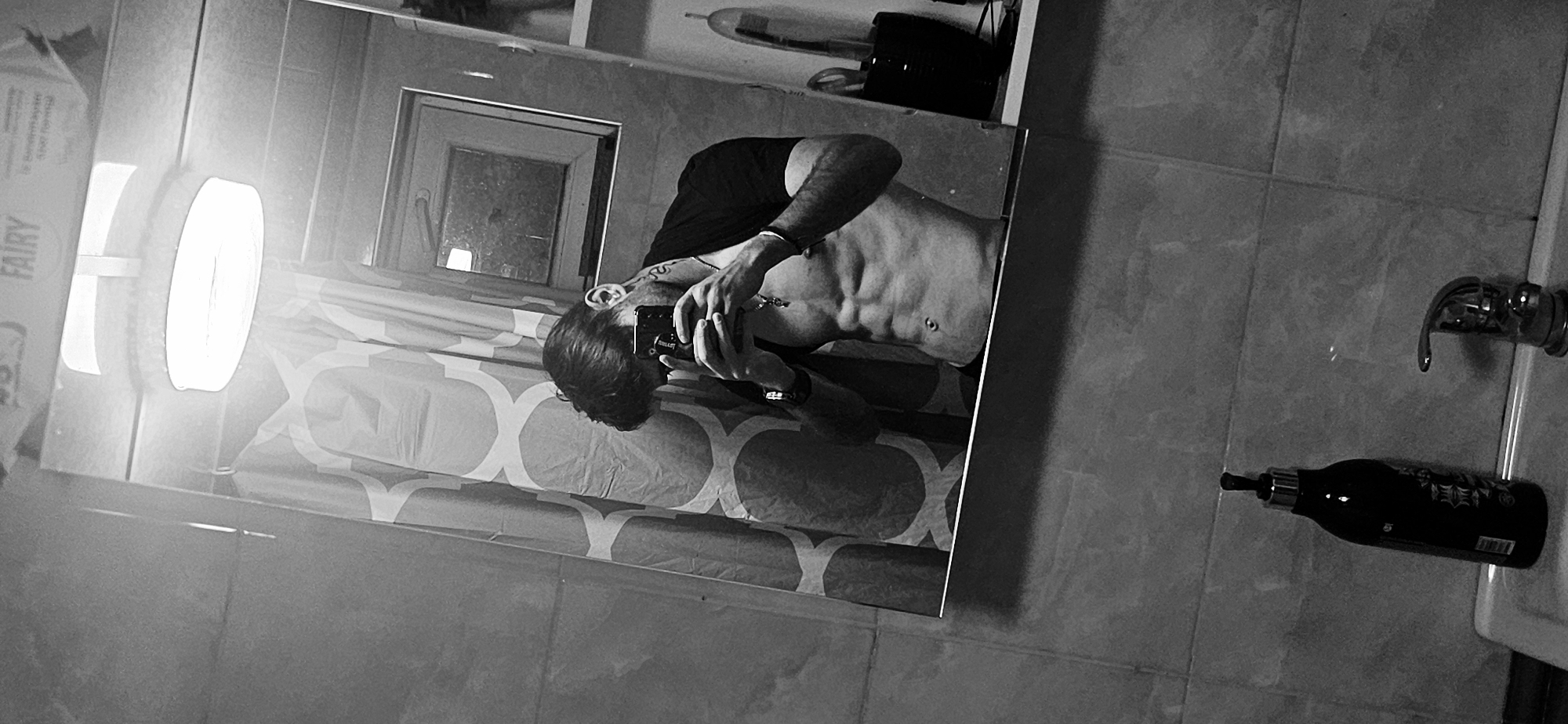 Man takes multiple bathroom mirror selfies in Kostenets, Bulgaria