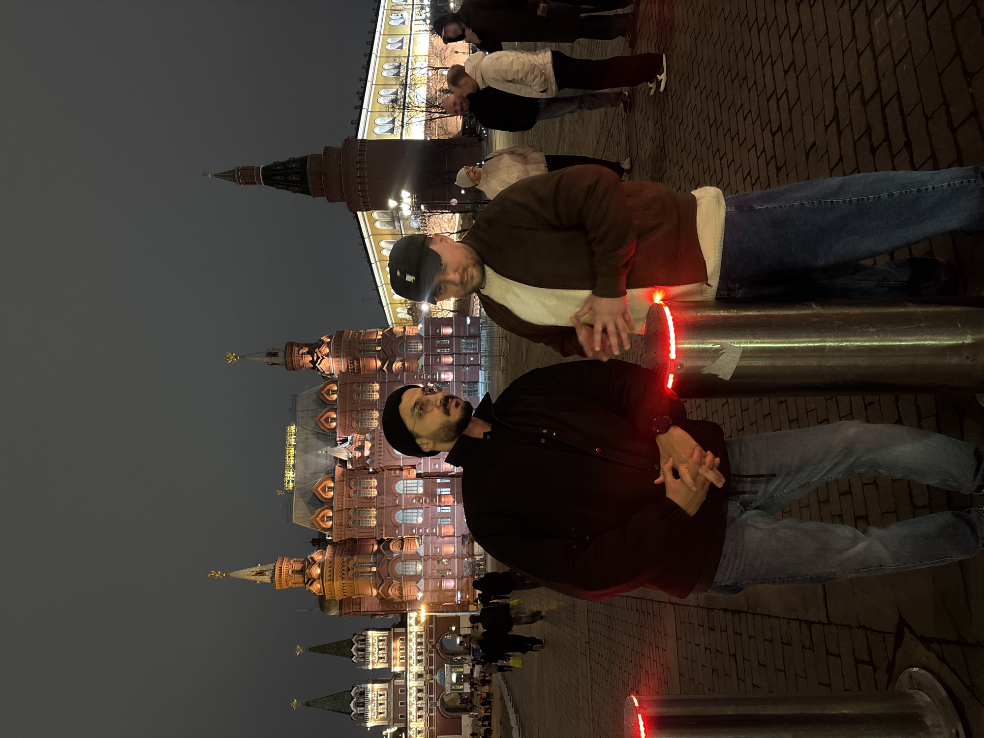 Two men photographed in Moscow square near Historical Museum