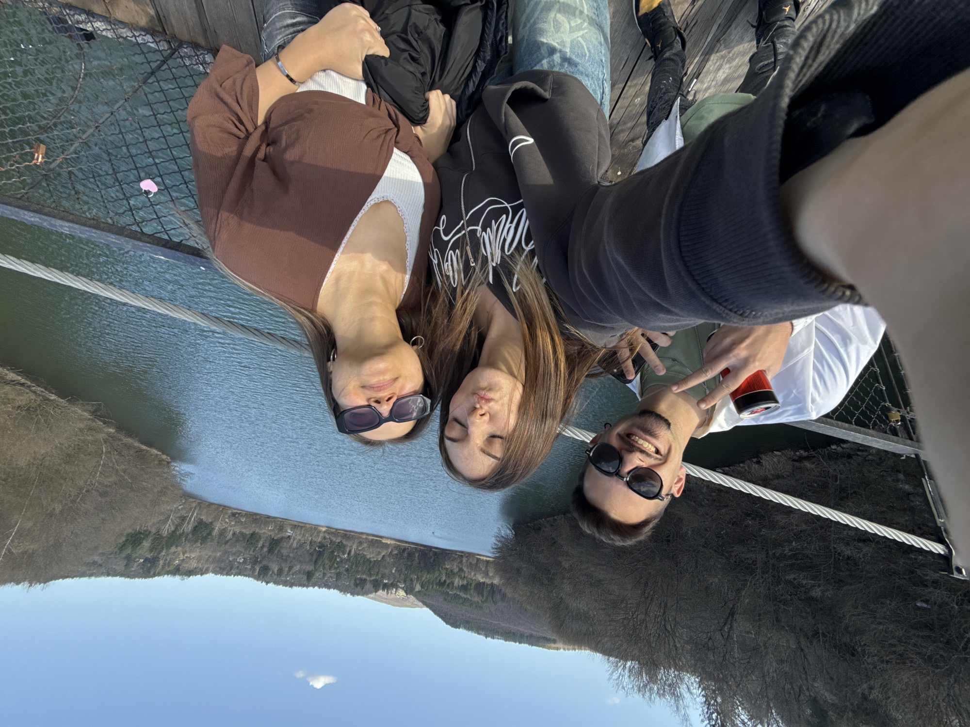 Couples pose for photos, attach love locks on Bulgarian bridge