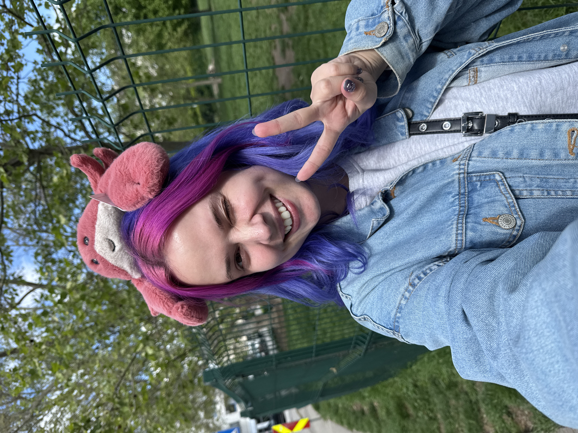 Woman takes playful selfies with plush toy in Zagreb
