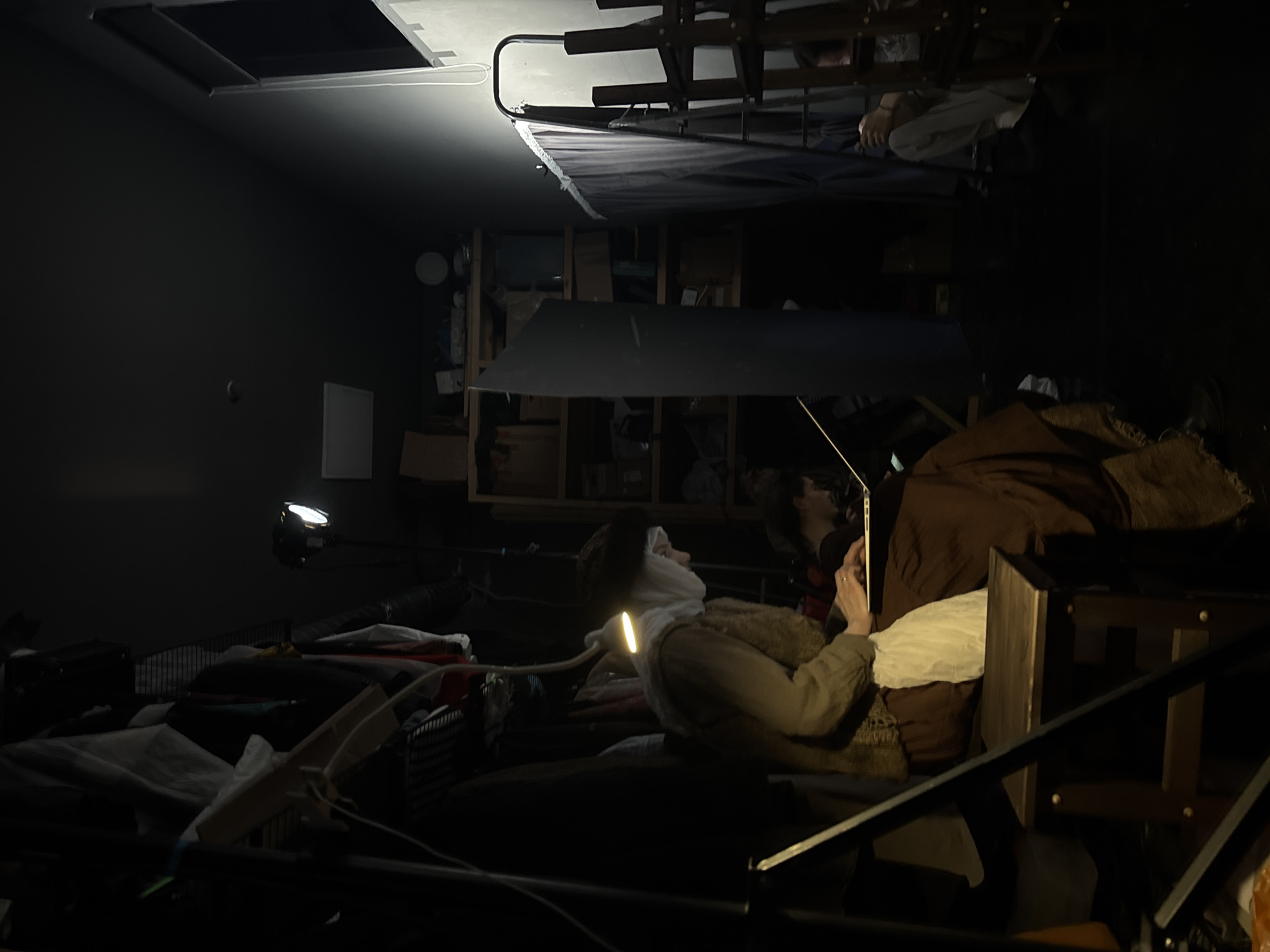Moscow residents captured in cluttered room, one lying down