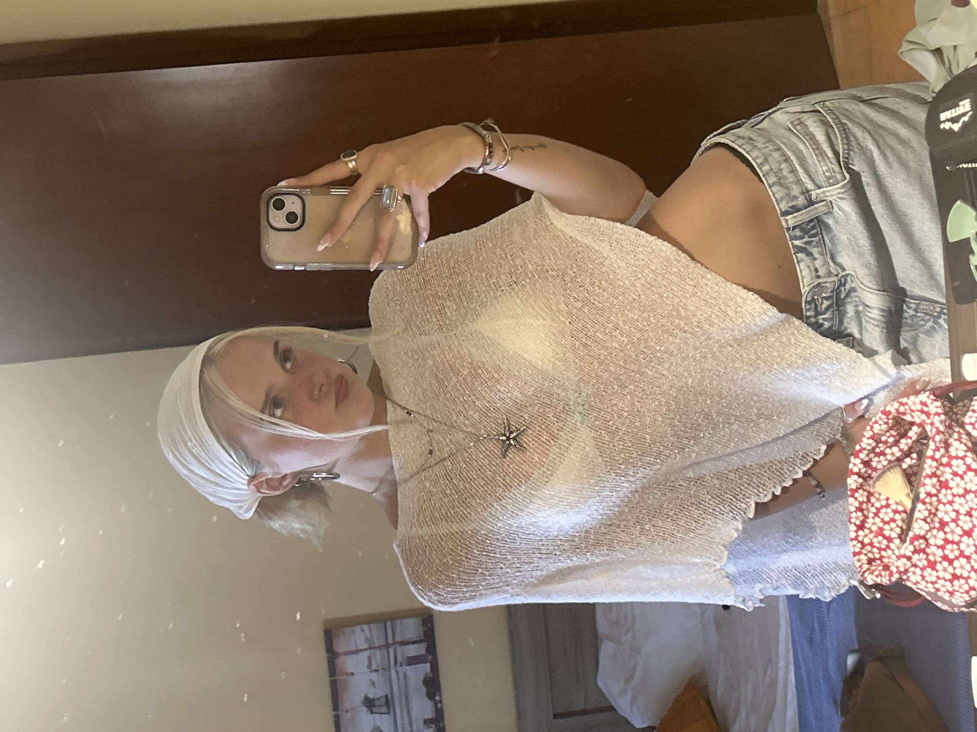 Mirror and portrait shots in a Greek bedroom, white headscarf look.