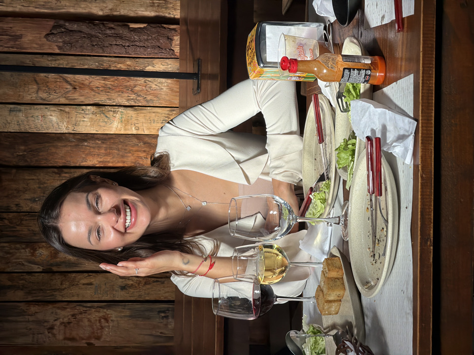 Diners enjoy traditional grilled meat meal in Funchal, Portugal