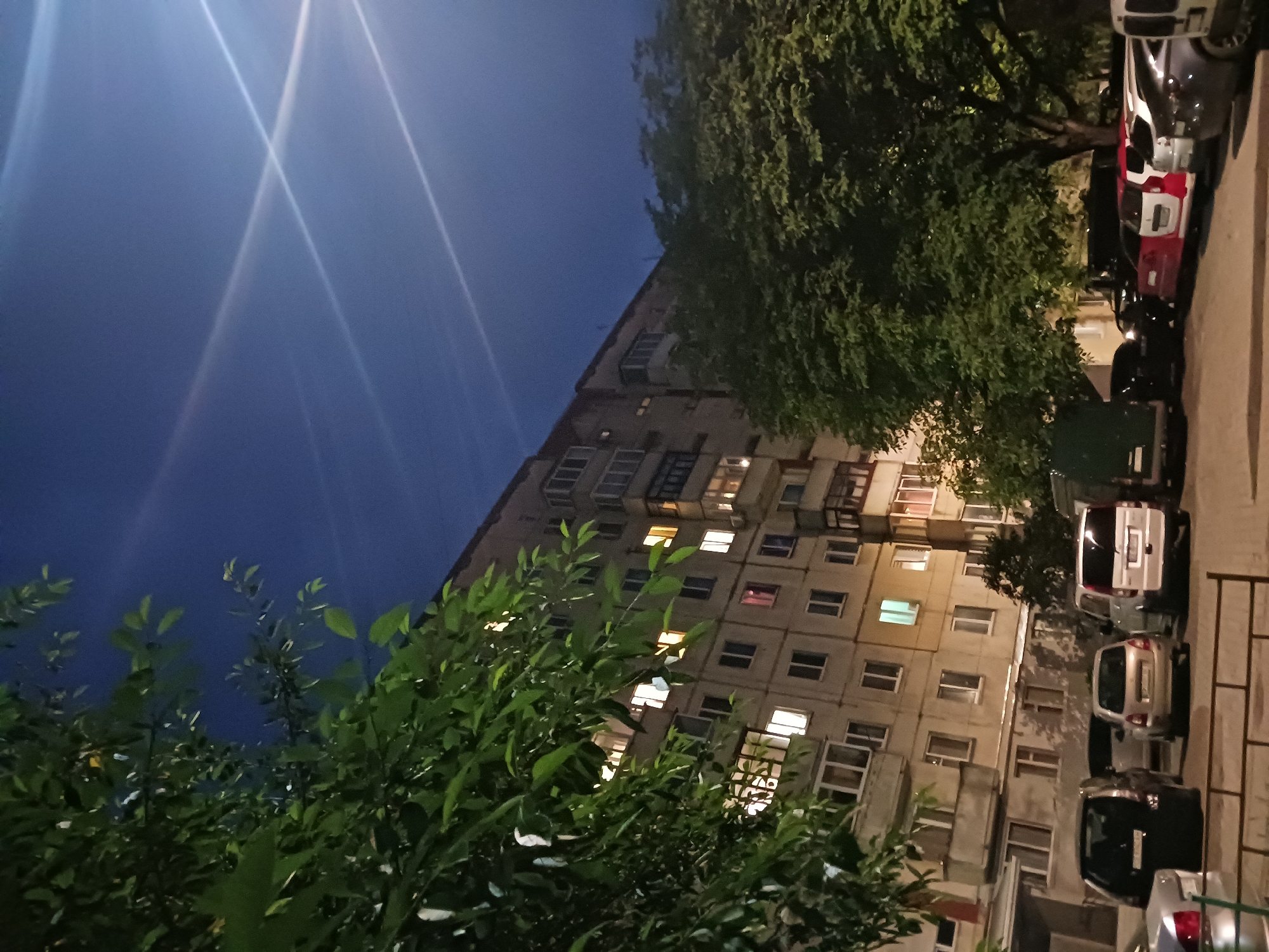 A summer evening in and around an apartment building