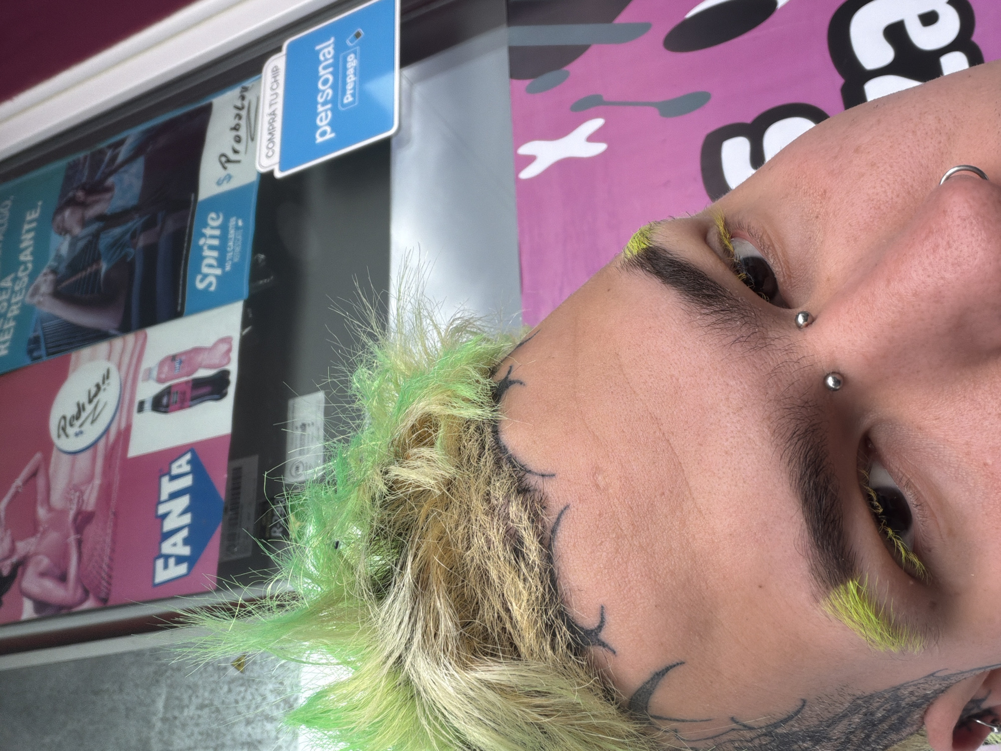 Green-haired person spotted at Ushuaia beverage display