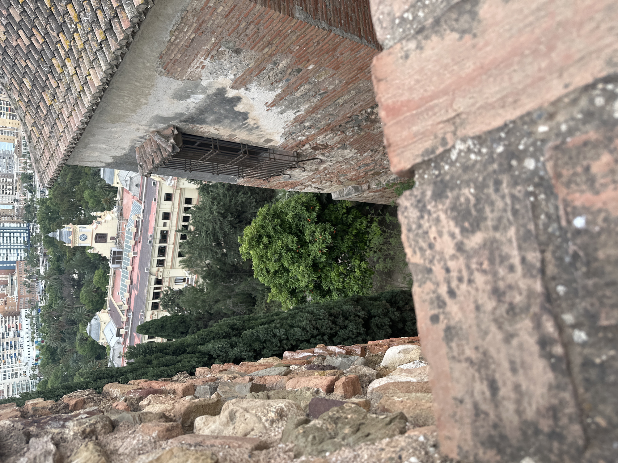Tourist captures panoramic views of Málaga from historic fortification