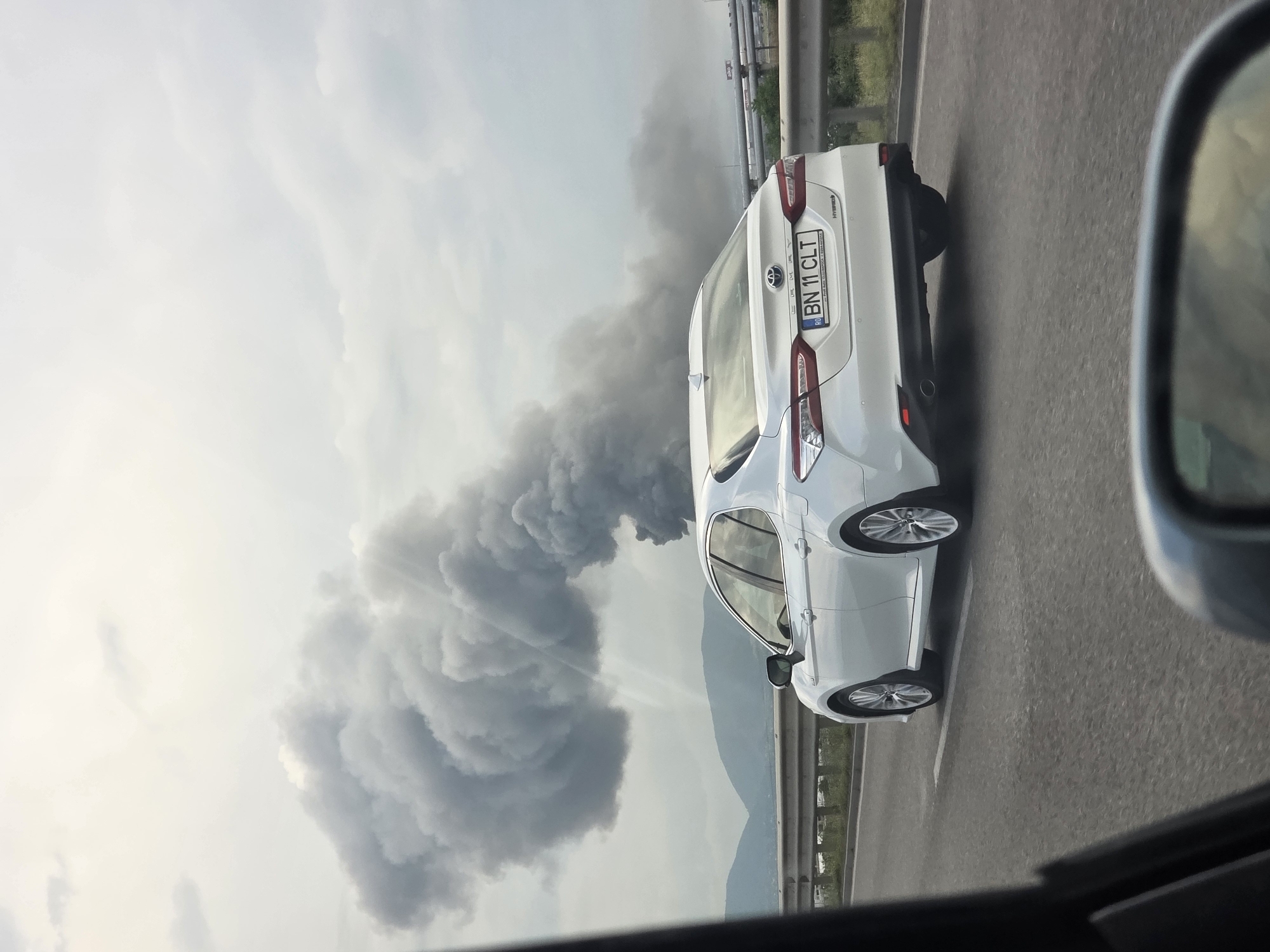 Dark smoke rises near highway outside Voluyak, Bulgaria