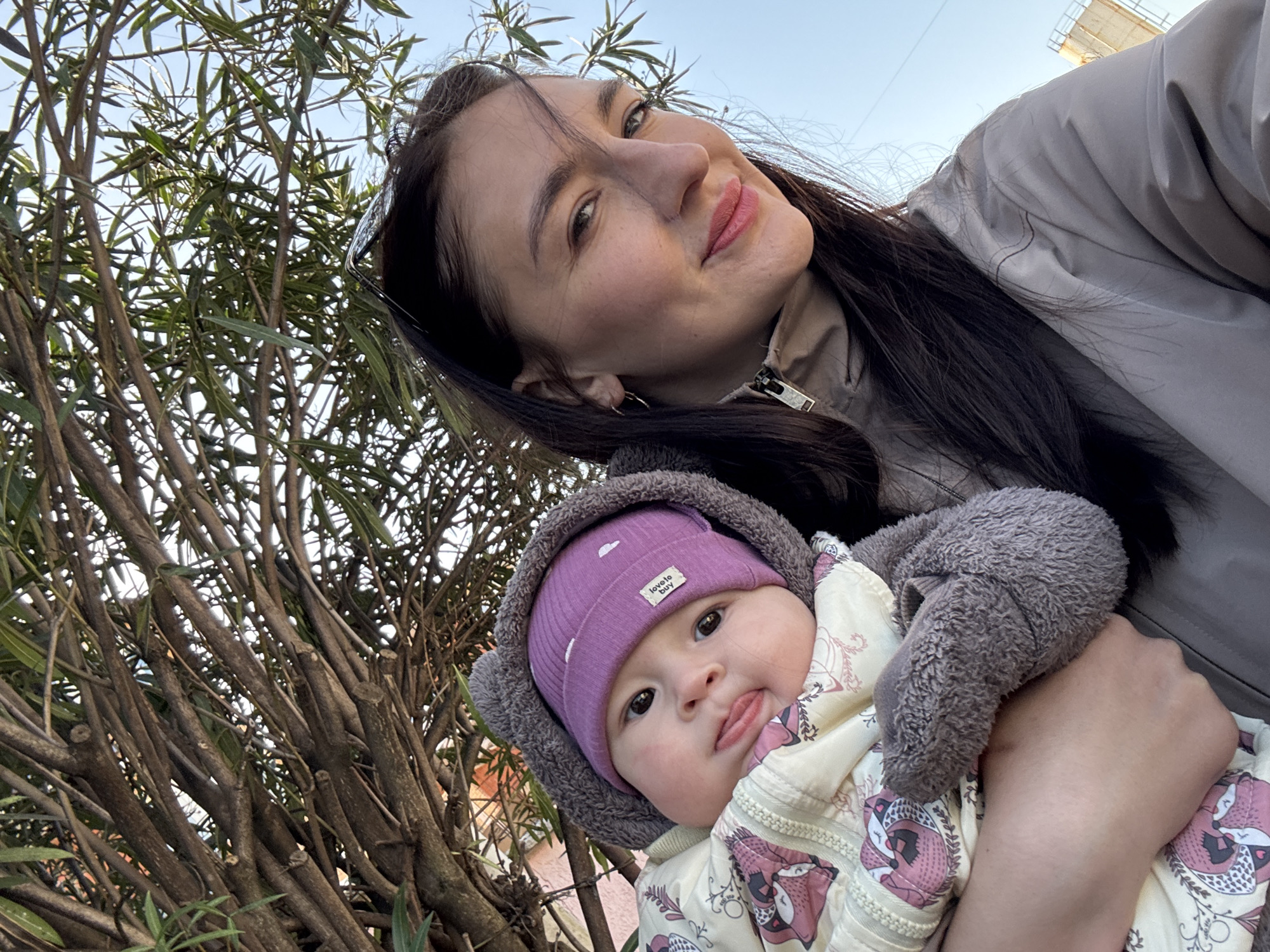 Mother enjoys coffee outing with baby in Sochi