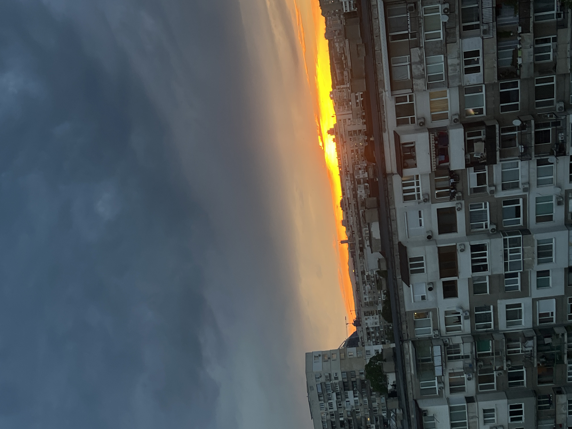Sunset cityscape captured over Sofia apartment blocks