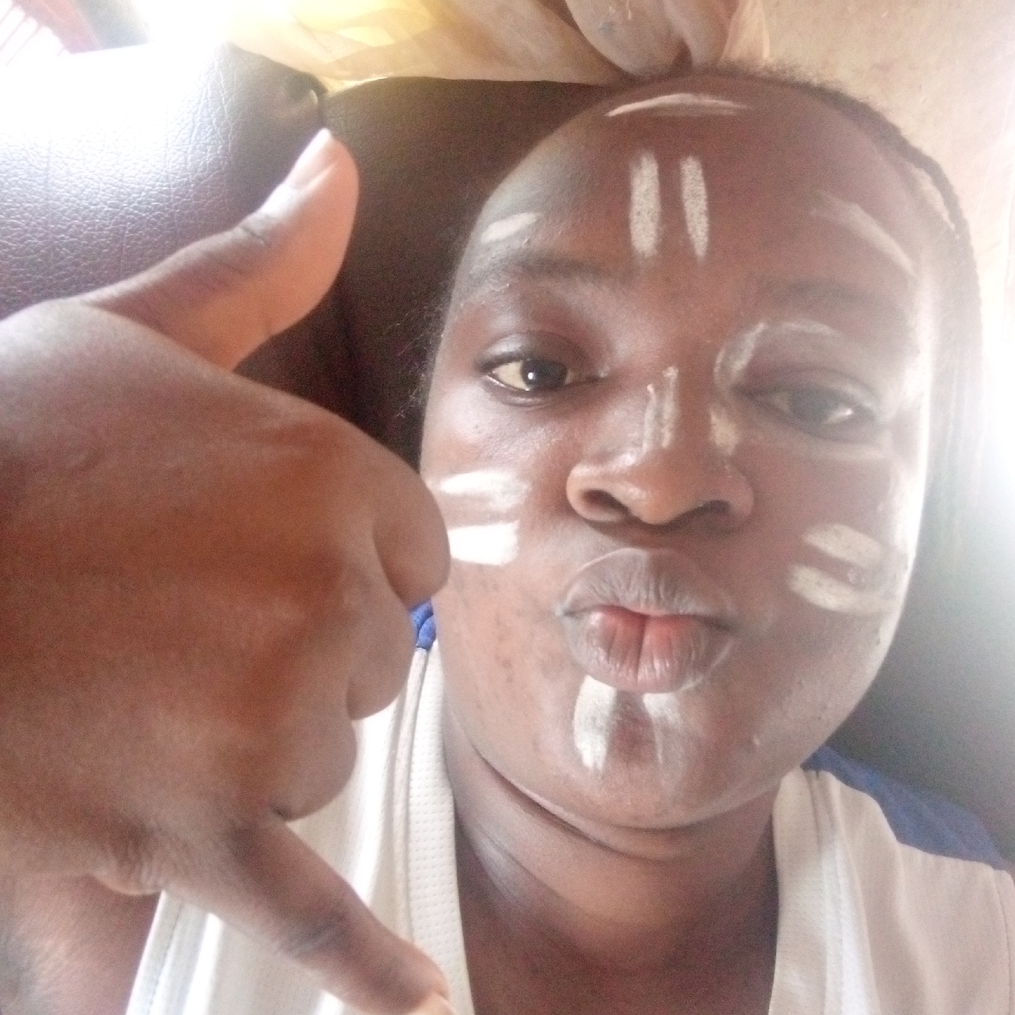 Traditional face painting ritual documented in Ogidi, Nigeria